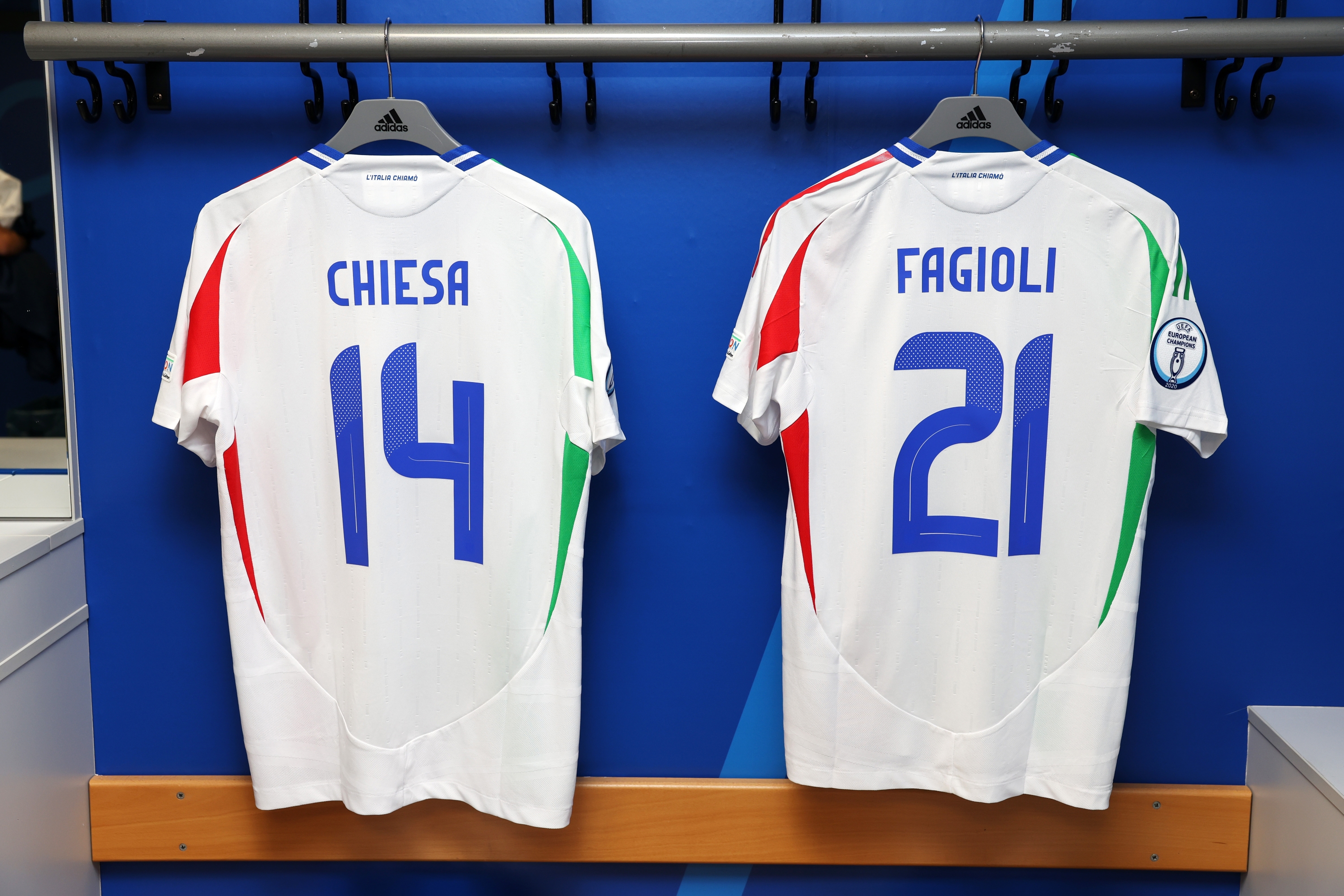 GELSENKIRCHEN, GERMANY - JUNE 20: The shirts of Federico Chiesa and Nicolo Fagioli are displayed inside the Italy dressing room prior to the UEFA EURO 2024 group stage match between Spain and Italy at Arena AufSchalke on June 20, 2024 in Gelsenkirchen, Germany. (Photo by Claudio Villa/Getty Images for FIGC)