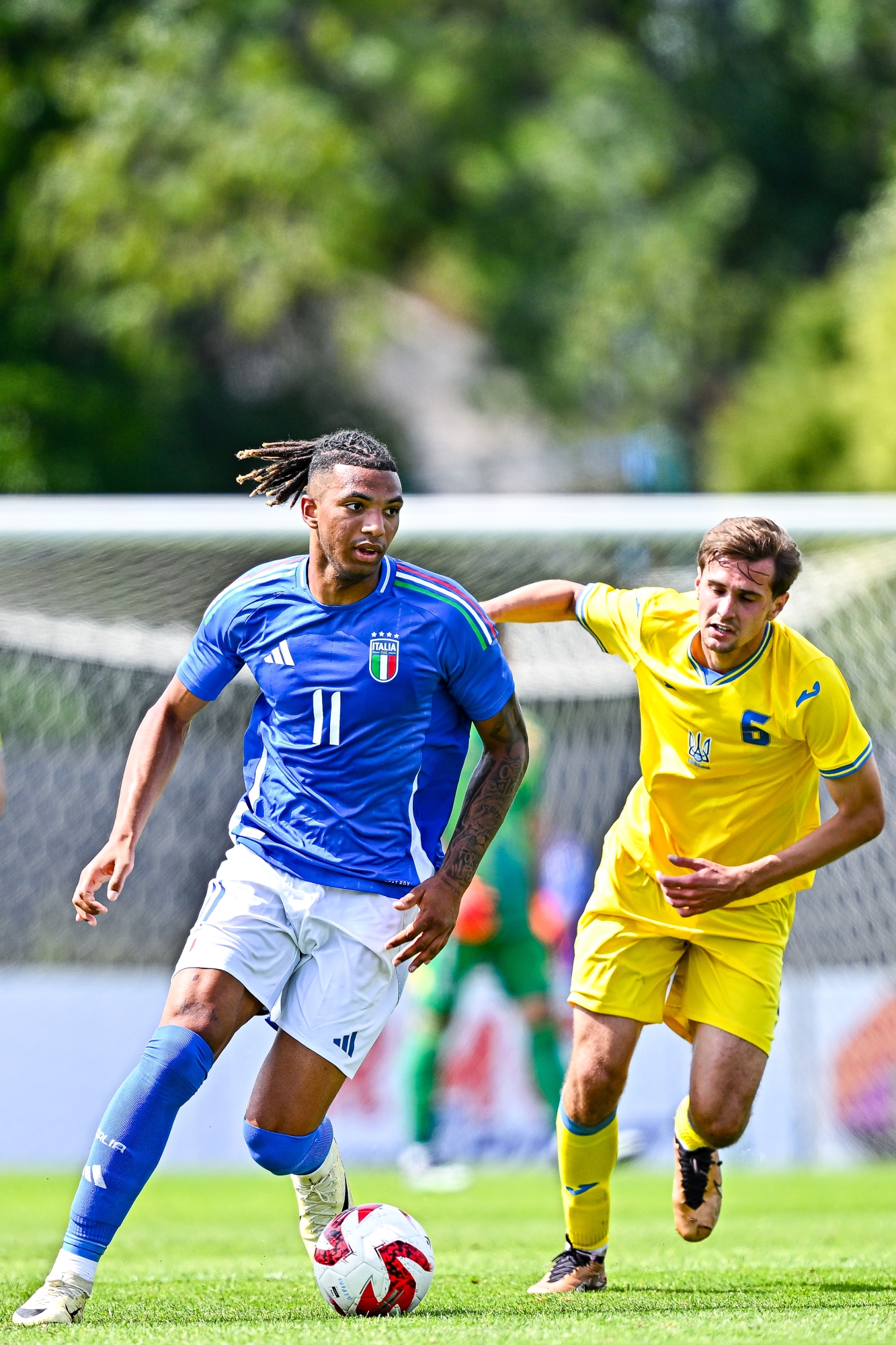 AUBAGNE, FRANCE - JUNE 6: Cher Ndour of Italy U21 (left) and Denys Shostak of Ukraine U21 vie for the ball during the 50th Tournoi Maurice Revello match between Ukraine U21 and Italy U21 at Stade de Lattre on June 6, 2024 in Aubagne, France.  (Photo by Simone Arveda/Getty Images)