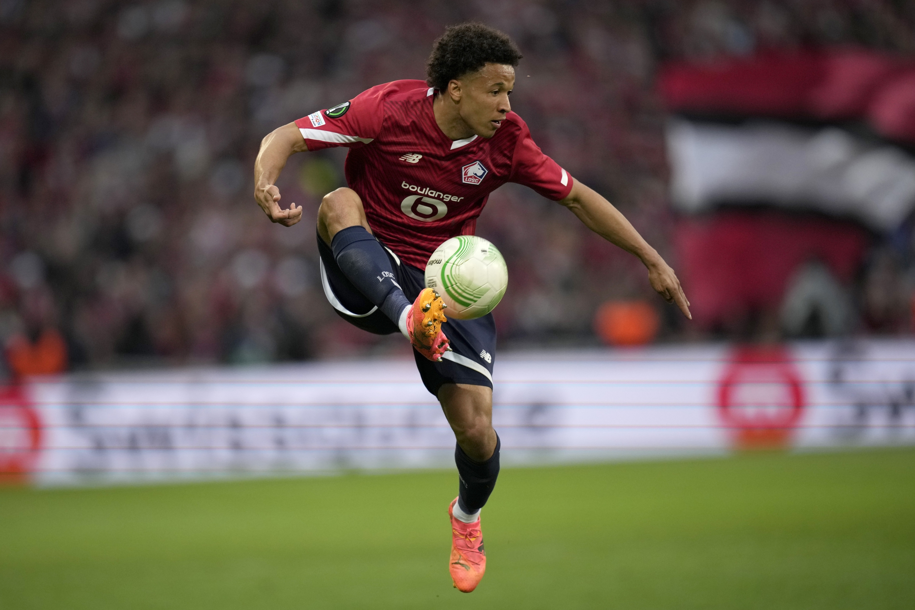 Lille's Tiago Santos controls the ball during the Europa Conference League quarter final second leg soccer match between Lille and Aston Villa at the Pierre Mauroy stadium in Villeneuve d'Ascq, northern France, Thursday, April 18, 2024. (AP Photo/Christophe Ena)