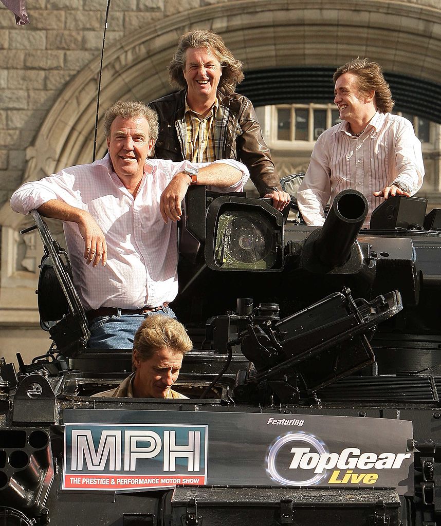 Television presenters Jeremy Clarkson, Richard Hammond and James May cross Tower Bridge on a military vehicle on September 1, 2008 in London.  The trio took part in the stunt to promote a live travelling show version of their popular TV series Top Gear.