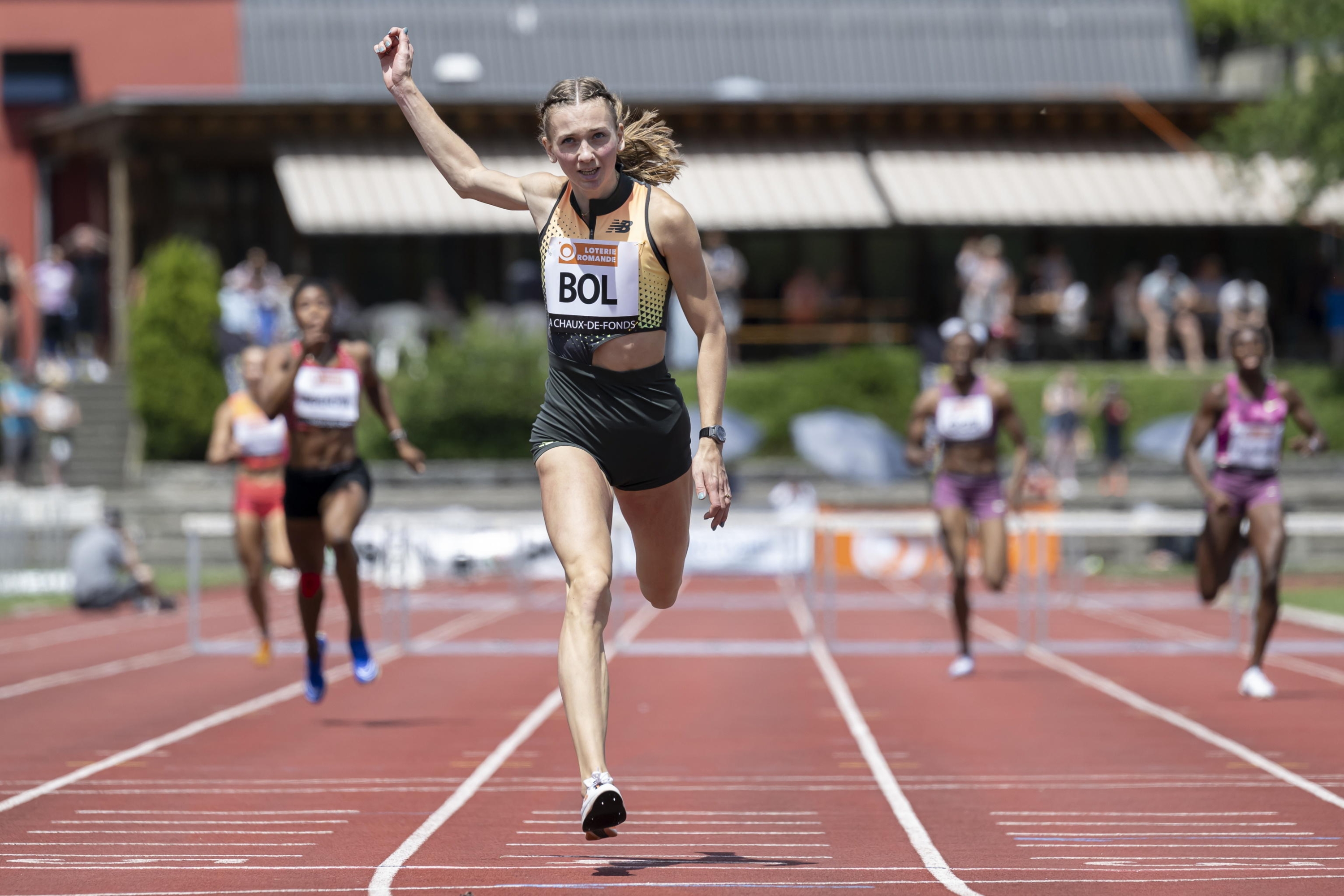 epa11477248 Femke Bol of Netherlands crosses the finish line in the 400 metres hurdles Women during the 44th edition of Resisprint International, at the Stade de la Charriere, in La Chaux-de-Fonds, Switzerland, 14 July 2024. EPA/ANTHONY ANEX