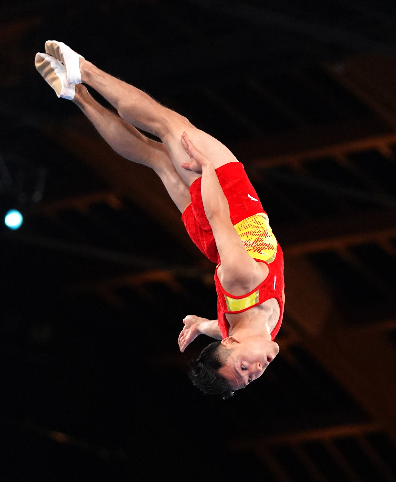(210731) -- TOKYO, July 31, 2021 (Xinhua) -- Dong Dong of China competes during the trampoline gymnastics men's final at the Tokyo 2020 Olympic Games in Tokyo, Japan, July 31, 2021. (Xinhua/Cheng Min) (Photo by Cheng Min / XINHUA / Xinhua via AFP)