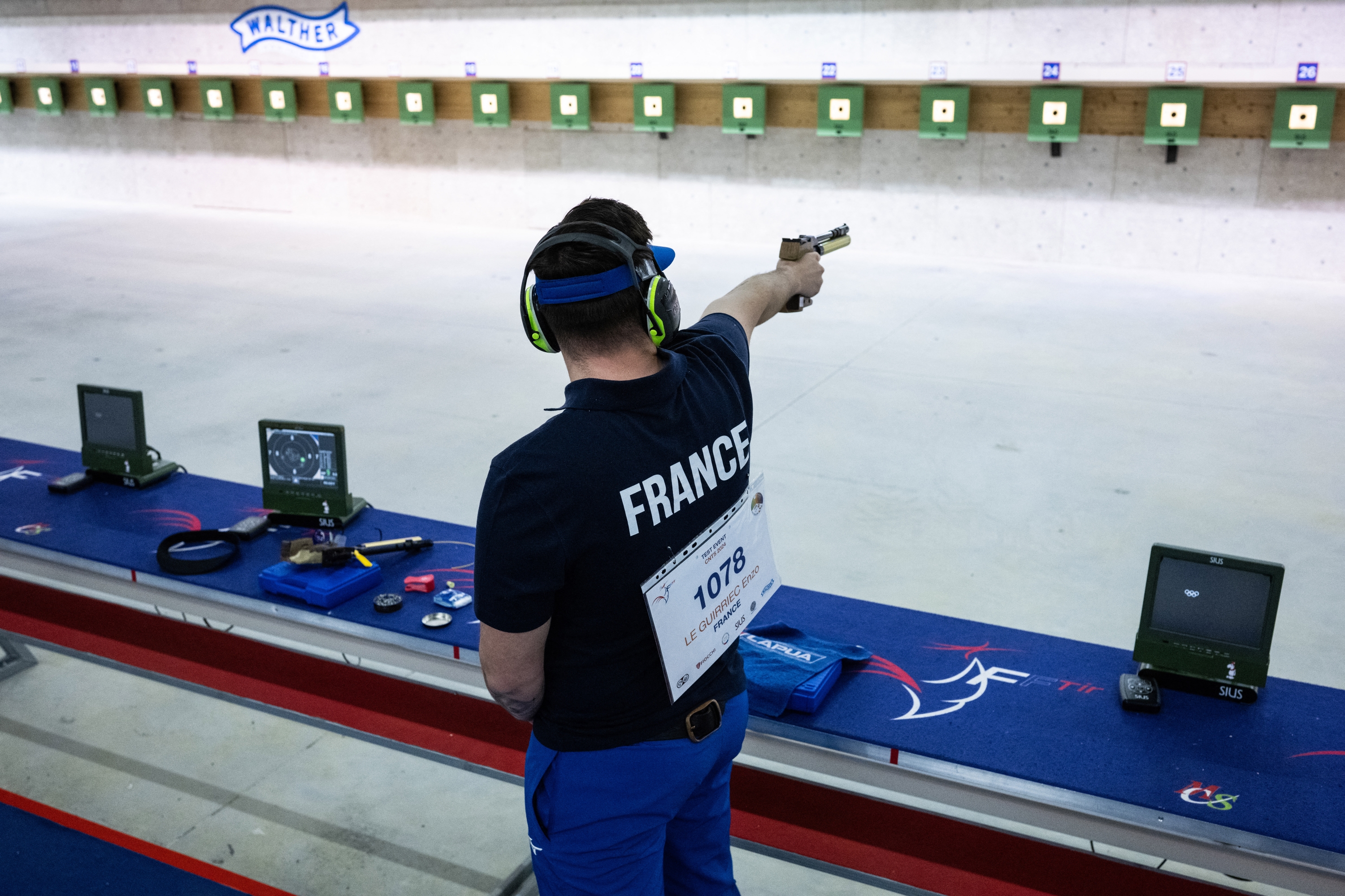 French Enzo Le Guirriec practices during the 10m air pistol training session, at the National Shooting Center (CNTS), in Deols near Châteauroux, on April 8, 2024, where the Paris 2024 Olympic Games shooting event will take place in July. (Photo by MARTIN BUREAU / AFP)