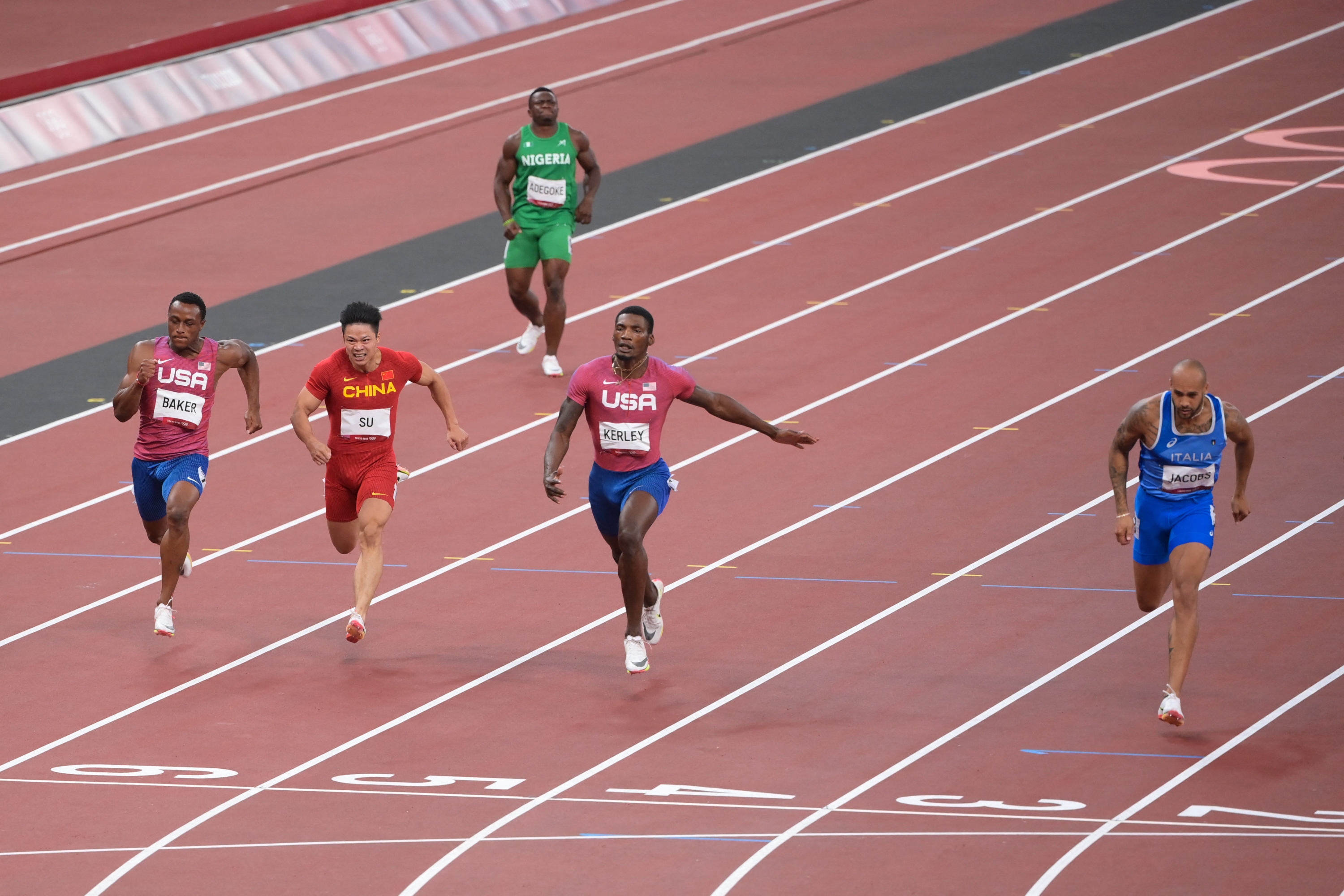 Lamont Marcell Jacobs (ITA), Fred Kerley (USA)competes in Athletics Men's 100m final during the Olympic Games Tokyo 2020, at Olympic Stadium, on August 01, 2021, in Tokyo, Japan, Photo Philippe Montigny / KMSP (Photo by MONTIGNY Philippe / KMSP / KMSP via AFP)