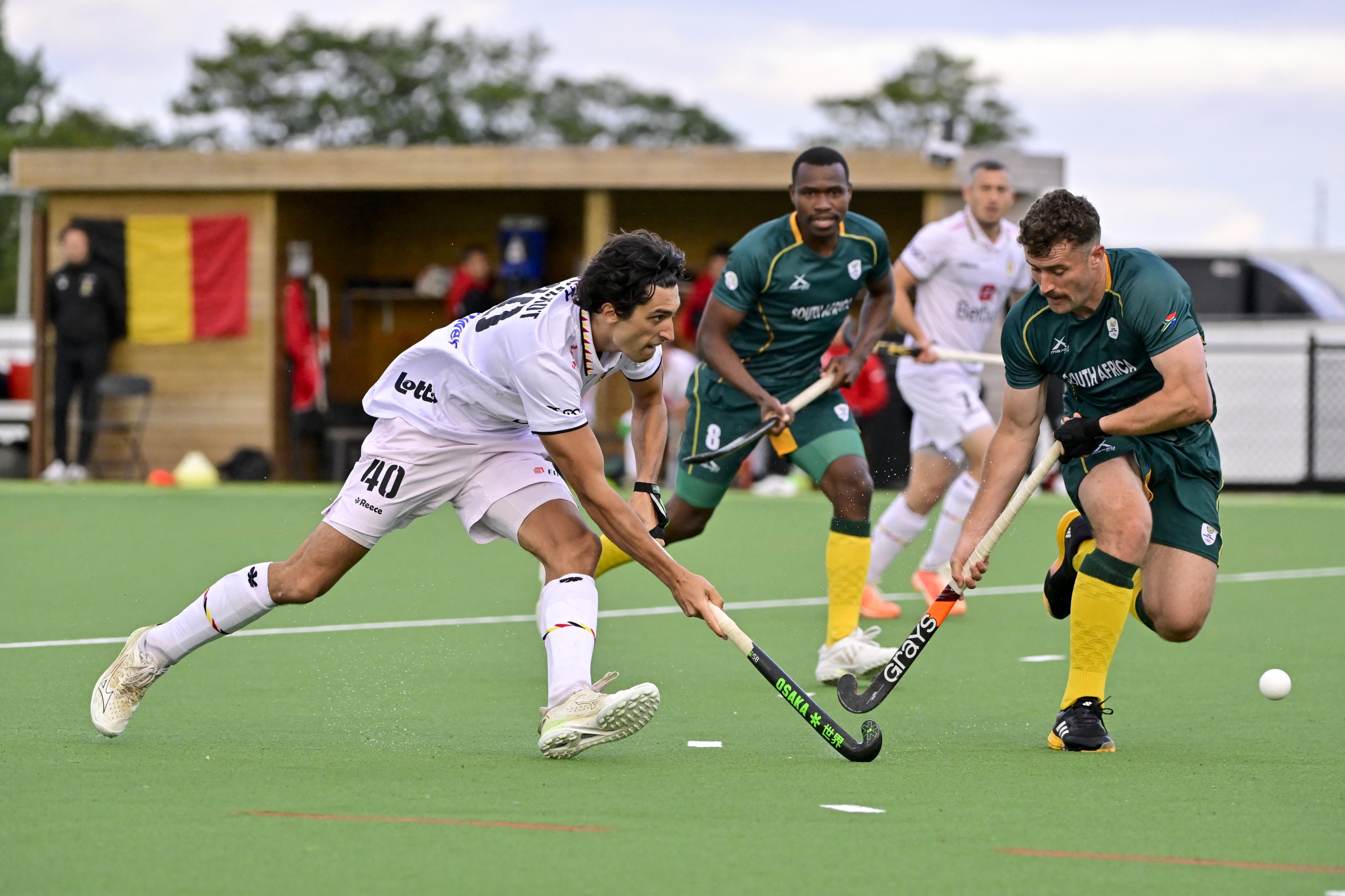 Belgium's Roman Duvekot and South African Matthew Guise-Brown pictured in action during a friendly hockey match between the Belgian Red Lions and South Africa, Friday 12 July 2024 in Kortrijk, in preparation of the 2024 Olympic Games. BELGA PHOTO DIRK WAEM (Photo by DIRK WAEM / BELGA MAG / Belga via AFP)