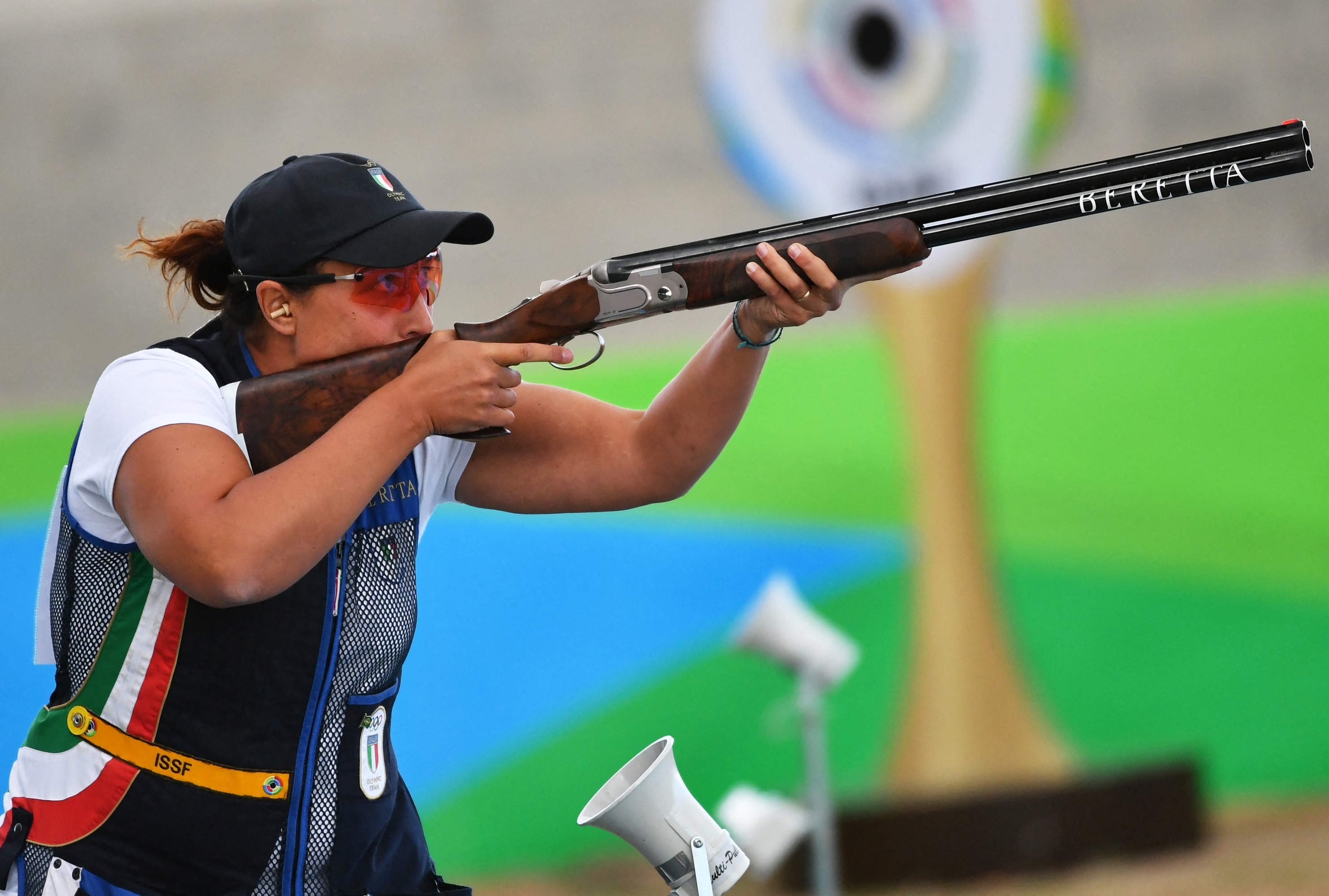 Gold medal winner Italy's Diana Bacosi competes during the Skeet Women's Finals shooting event at the Rio 2016 Olympic Games at the Olympic Shooting Centre in Rio de Janeiro on August 12, 2016. (Photo by PASCAL GUYOT / AFP)