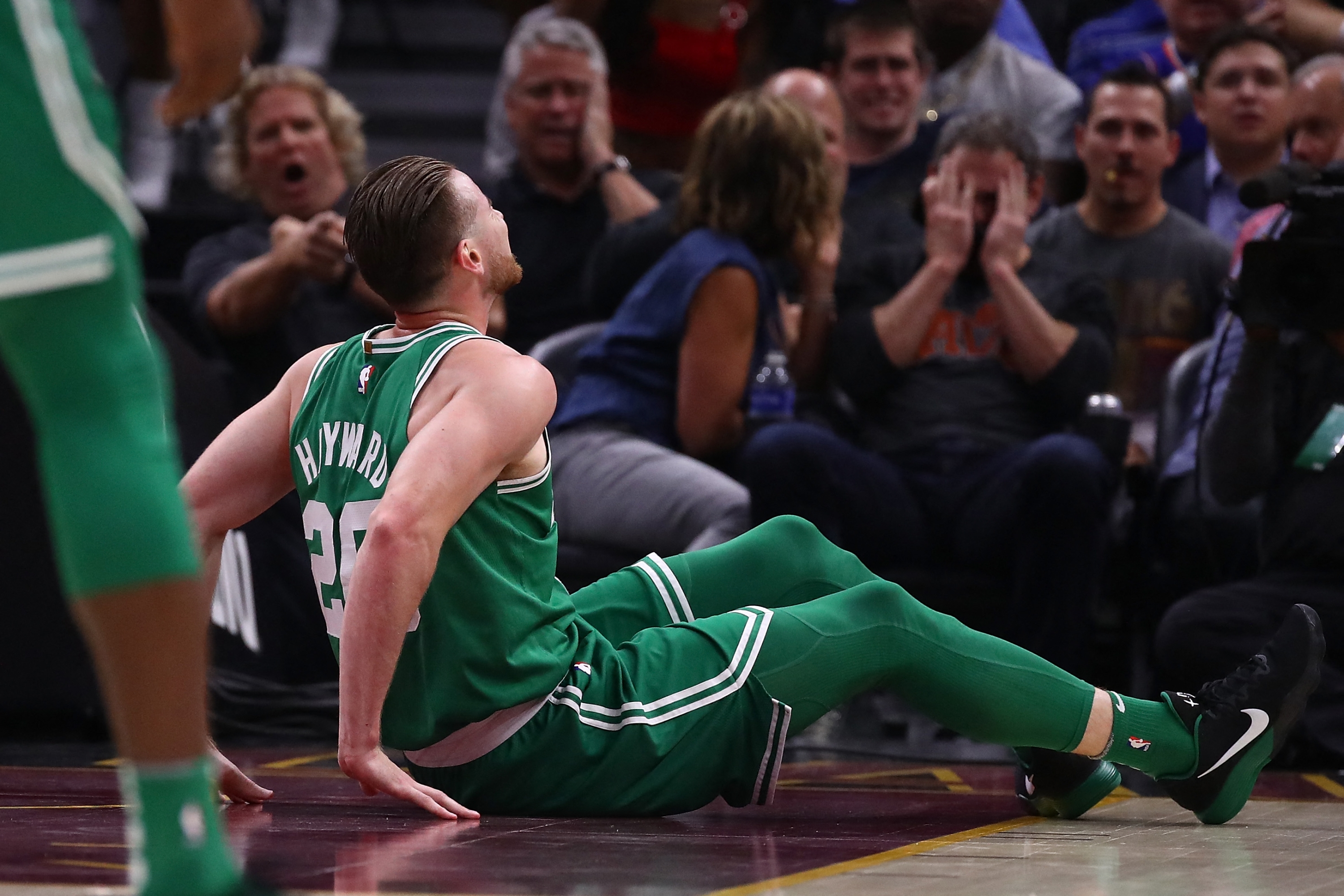 CLEVELAND, OH - OCTOBER 17: Gordon Hayward #20 of the Boston Celtics is sits on the floor after being injured while playing the Cleveland Cavaliers at Quicken Loans Arena on October 17, 2017 in Cleveland, Ohio. NOTE TO USER: User expressly acknowledges and agrees that, by downloading and or using this photograph, User is consenting to the terms and conditions of the Getty Images License Agreement.   Gregory Shamus/Getty Images/AFP (Photo by Gregory Shamus / GETTY IMAGES NORTH AMERICA / Getty Images via AFP)