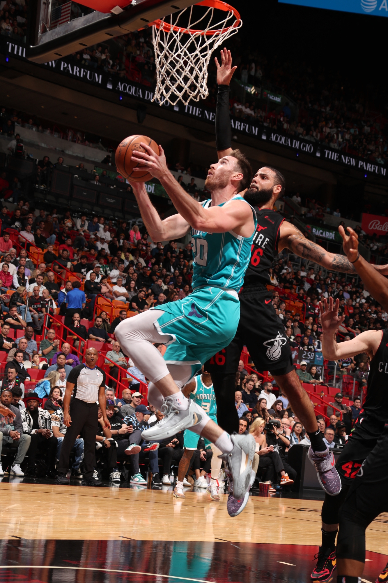 MIAMI, FL - DECEMBER 13: Gordon Hayward #20 of the Charlotte Hornets drives to the basket during the game against the Miami Heat on December 13, 2023 at Kaseya Center in Miami, Florida. NOTE TO USER: User expressly acknowledges and agrees that, by downloading and or using this Photograph, user is consenting to the terms and conditions of the Getty Images License Agreement. Mandatory Copyright Notice: Copyright 2023 NBAE   Issac Baldizon/NBAE via Getty Images/AFP (Photo by Issac Baldizon / NBAE / Getty Images / Getty Images via AFP)