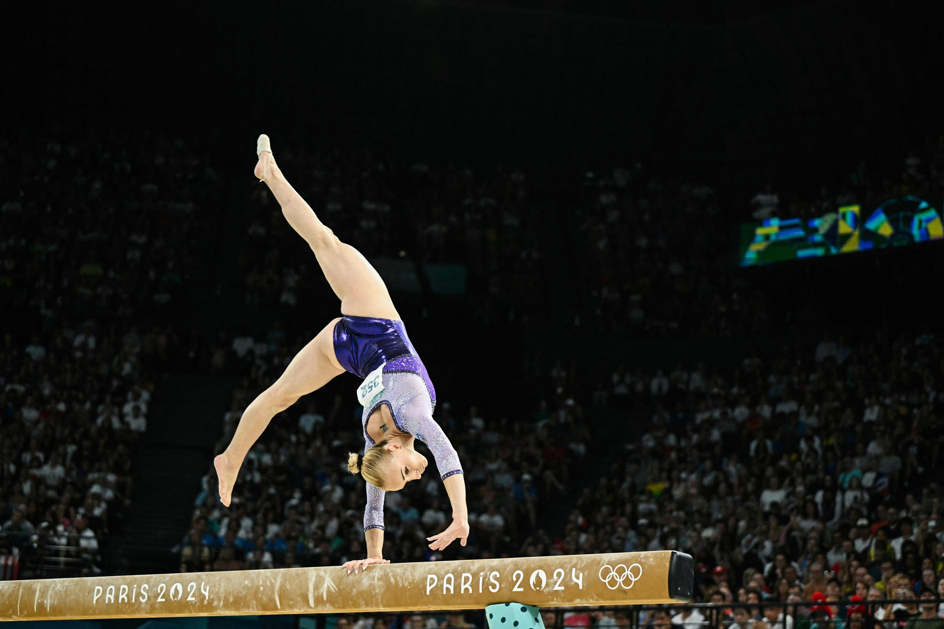 Italy's Alice D'amato competes in the artistic gymnastics women's balance beam final during the Paris 2024 Olympic Games at the Bercy Arena in Paris, on August 5, 2024. (Photo by Gabriel BOUYS / AFP)