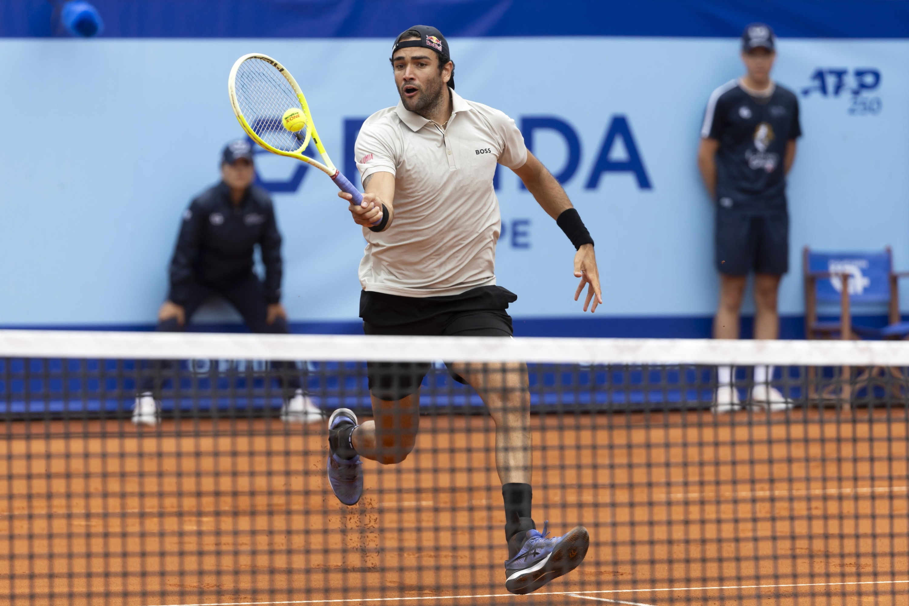 epa11490163 Matteo Berrettini of Italy in action during the final match against Quentin Halys of France at the Swiss Open tennis tournament in Gstaad, Switzerland, 21 July 2024.  EPA/PETER KLAUNZER