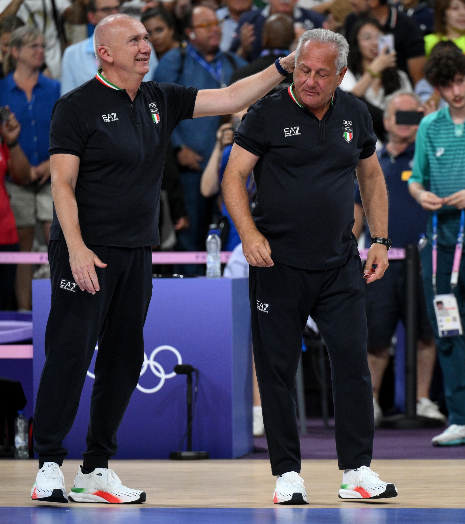 Head coach of Italy team Julio Velasco (R) cries as he celebrates after winning the Women's gold medal match between USA and Italy of the Volleyball competitions in the Paris 2024 Olympic Games, at the South Paris Arena in Paris, France, 11 August 2024. ANSA/ETTORE FERRARI