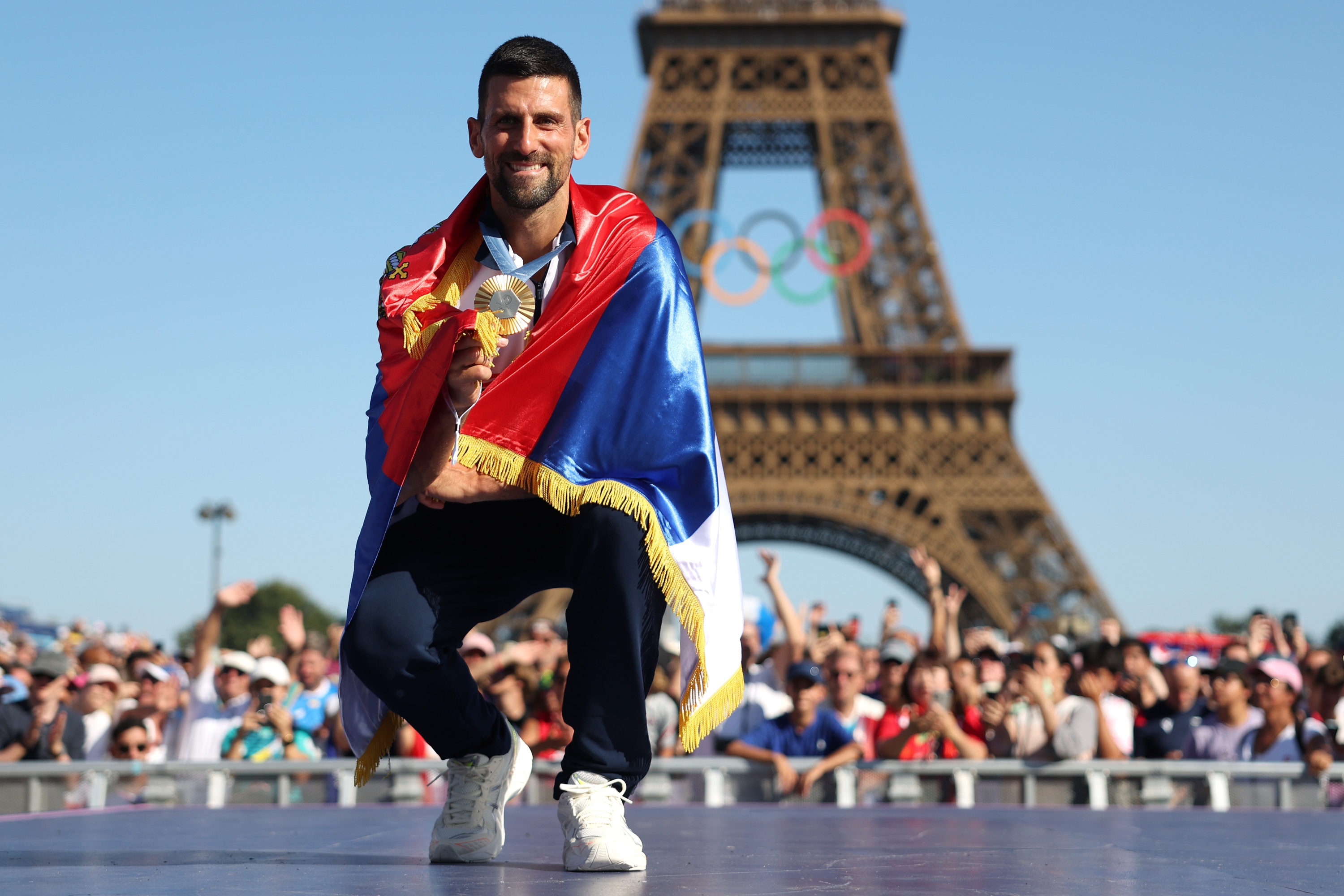 PARIS, FRANCE - AUGUST 05: Men's Tennis Singles gold medalist Novak Djokovic of Team Serbia poses for a photo with his medal at Champions Park on day ten of the Olympic Games Paris 2024 on August 05, 2024 in Paris, France. (Photo by Maja Hitij/Getty Images)