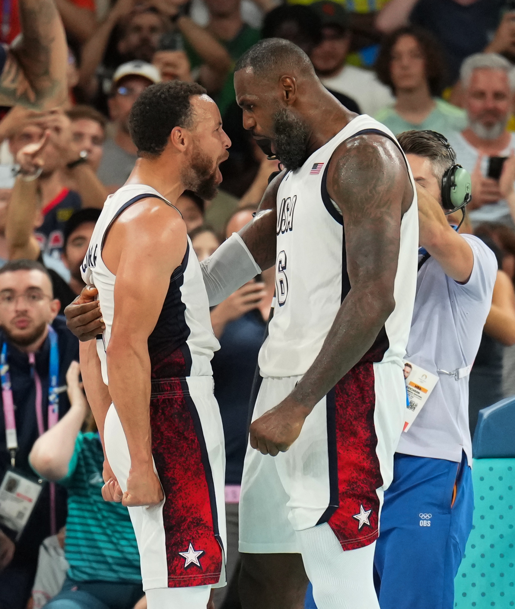 PARIS, FRANCE - AUGUST 8: Stephen Curry #4 and LeBron James #6 of the USA Men's National Team celebrates after the game during the Men's Semi-Finals on August 8, 2024 at the AccorHotels Arena in Paris, France. NOTE TO USER: User expressly acknowledges and agrees that, by downloading and/or using this photograph, user is consenting to the terms and conditions of the Getty Images License Agreement. Mandatory Copyright Notice: Copyright 2024 NBAE   Jesse D. Garrabrant/NBAE via Getty Images/AFP (Photo by Jesse D. Garrabrant / NBAE / Getty Images / Getty Images via AFP)