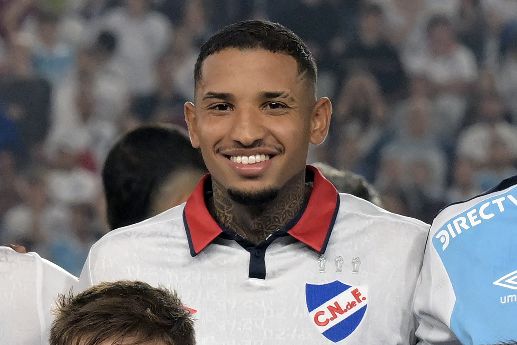 (FILES) Nacional's defender Juan Manuel Izquierdo poses for the team photo during the Copa Libertadores third round second leg football match between Uruguay's Nacional and Bolivia's Always Ready at the Gran Parque Central stadium in Montevideo, on March 14, 2024. Uruguay's Nacional player Juan Izquierdo, who suffered a heart attack five days ago in the middle of a Copa Libertadores match against Brazil's Sao Paulo, died on August 27 in Brazil, the Uruguayan club announced. (Photo by EITAN ABRAMOVICH / AFP)