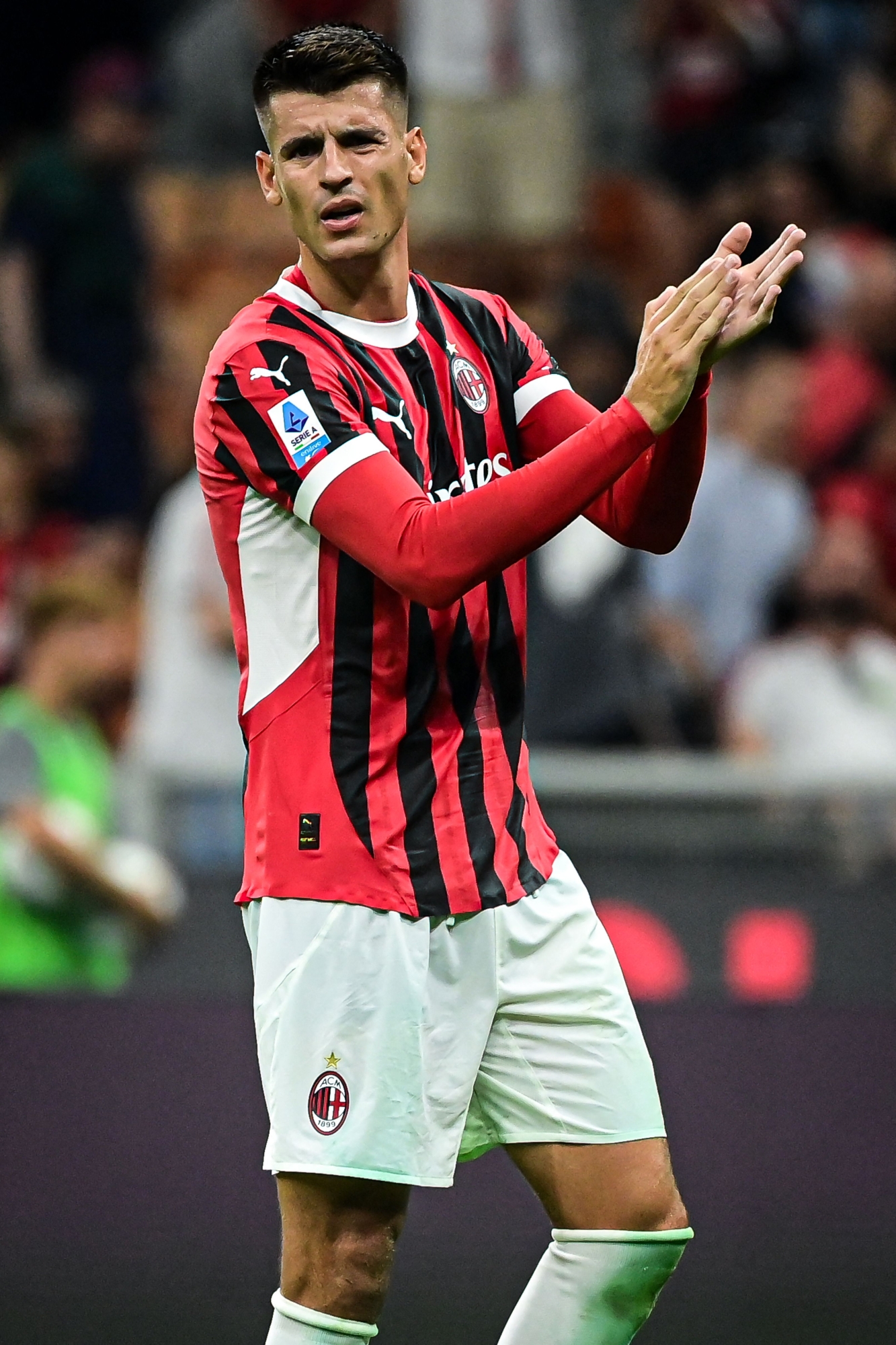 AC Milan's Spanish forward #07 Alvaro Morata gestures at the end of the Italian Serie A football match between AC Milan and Torino at the San Siro Stadium in Milan, on August 17, 2024. (Photo by Piero CRUCIATTI / AFP)