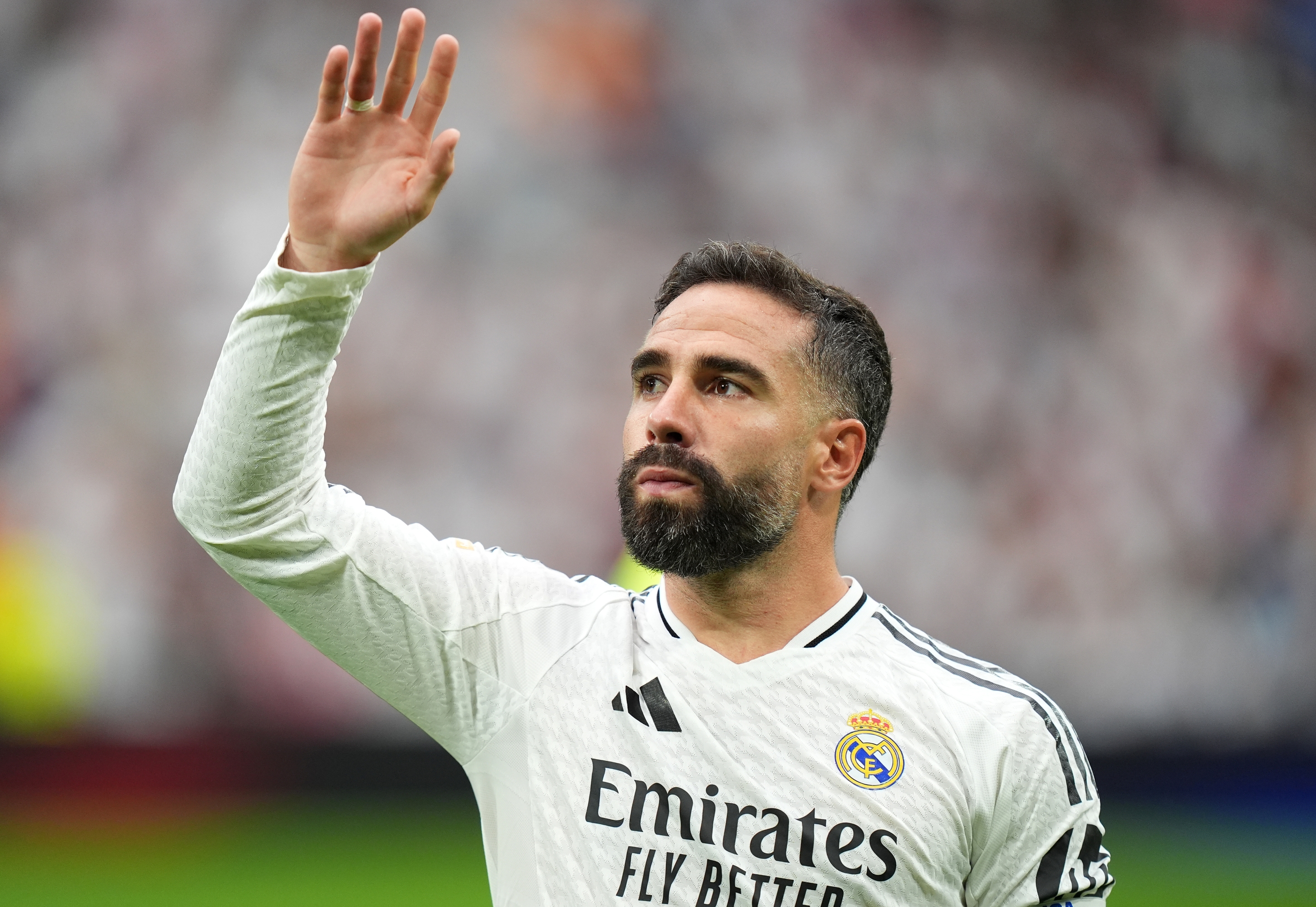 MADRID, SPAIN - AUGUST 25: Daniel Carvajal of Real Madrid acknowledges the fans prior to the La Liga match between Real Madrid CF and Real Valladolid CF at Estadio Santiago Bernabeu on August 25, 2024 in Madrid, Spain. (Photo by Angel Martinez/Getty Images)