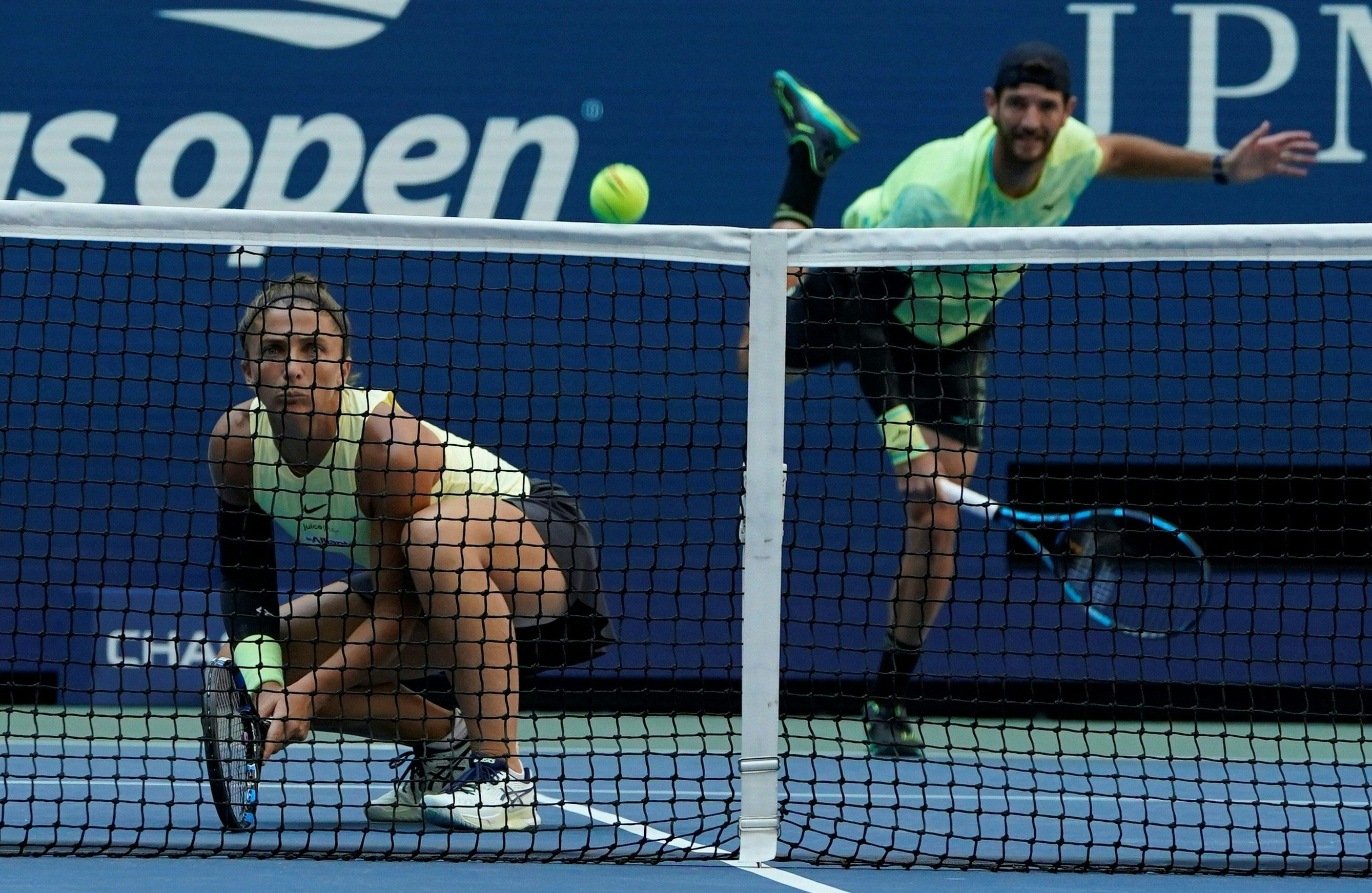 Italy's Sara Errani and Andrea Vavassori play against USA's Taylor Townsend and Donald Young during their mixed doubles final match on day eleven of the US Open tennis tournament at the USTA Billie Jean King National Tennis Center in New York City, on September 5, 2024. (Photo by TIMOTHY A. CLARY / AFP)