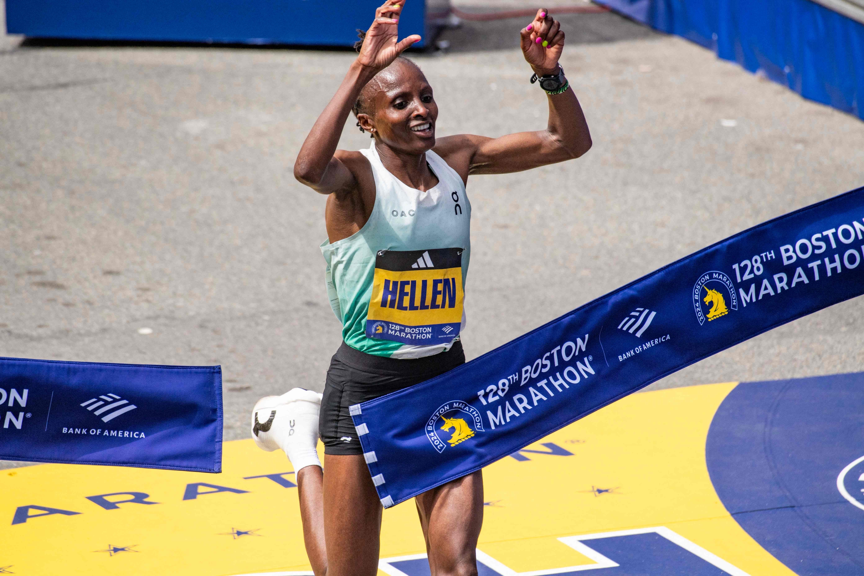 TOPSHOT - Hellen Obiri of Kenya takes first place in the womens professional field during the 128th Boston Marathon in Boston, Massachusetts, on April 15, 2024. The marathon includes around 30,000 athletes from 129 countries running the 26.2 miles from Hopkinton to Boston, Massachusetts.  The event is the world's oldest annually run marathon. (Photo by Joseph Prezioso / AFP)