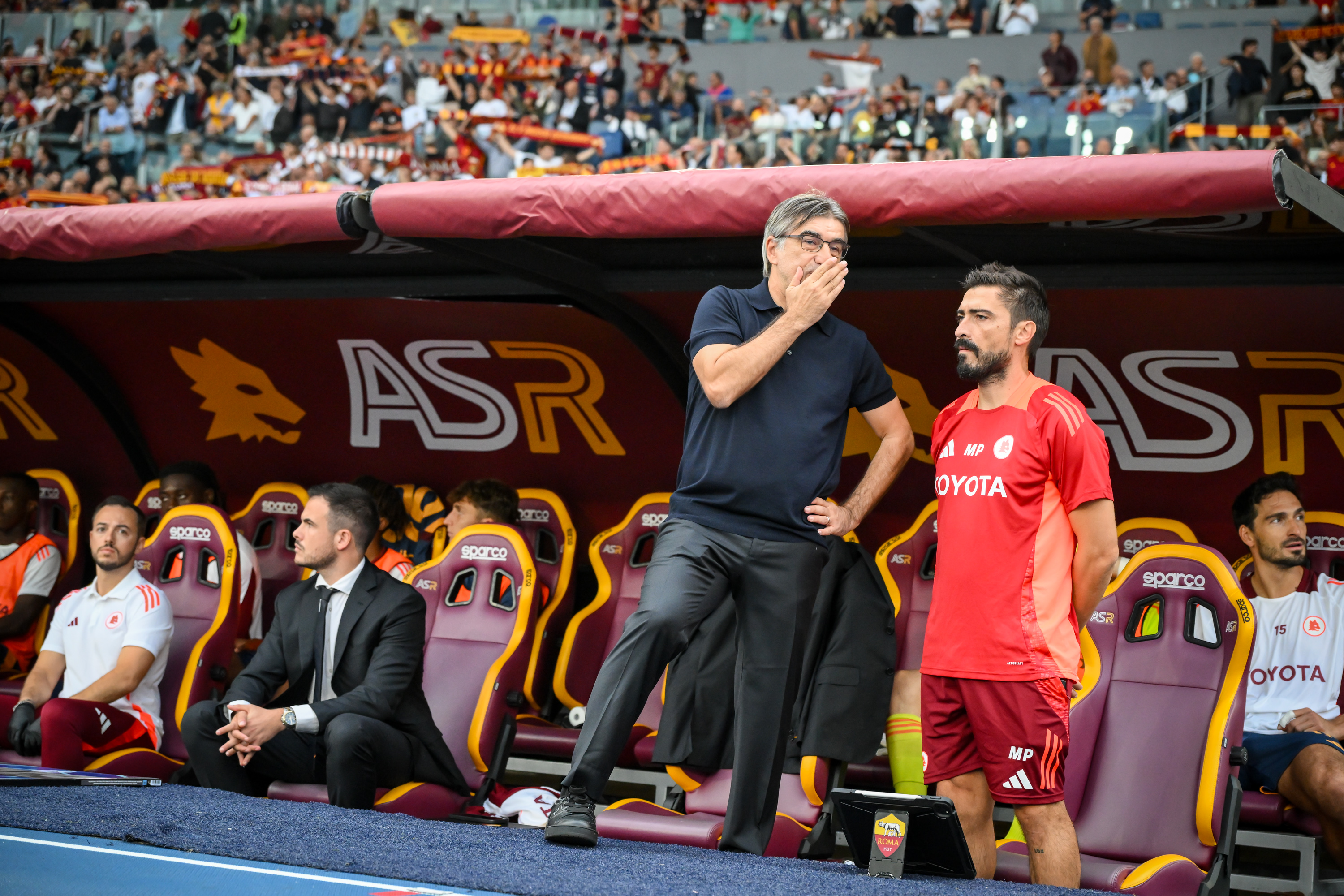 ROME, ITALY - SEPTEMBER 22: AS Roma coach Ivan Juric and his assistant Matteo Paro during the Serie match between Roma and Udinese at Stadio Olimpico on September 22, 2024 in Rome, Italy. (Photo by Fabio Rossi/AS Roma via Getty Images)