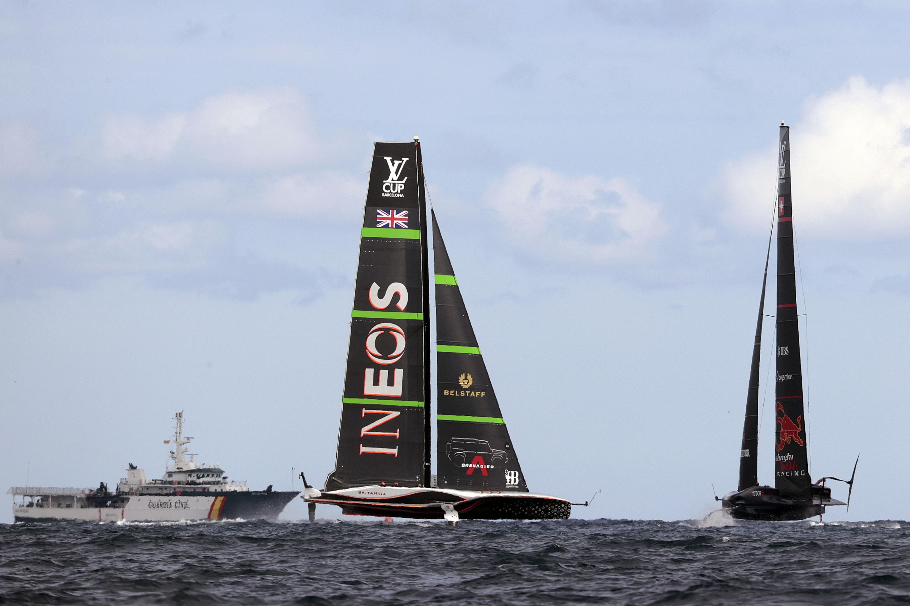 epa11612208 Alinghi Red Bull Racing of Switzerland and INEOS Britannia (L) of Britain compete on the fourth day of the Louis Vuitton Cup Semi-Finals within the America's Cup sailing competition, in Barcelona, Spain, 18 September 2024  EPA/TONI ALBIR