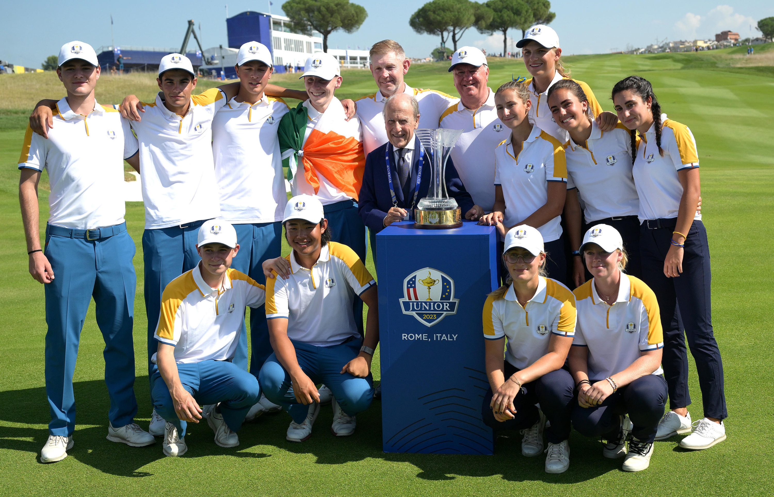 European team receive the trophy from FIG President Franco Chimenti (C) on the 18th green after winning the Junior Ryder Cup ahead the 44th Ryder Cup at Marco Simone Golf Club in Guidonia, near Rome, Italy, 28 September 2023. The 44th Ryder Cup matches between the US and Europe will be held in Italy from 29 September to 01 October 2023.   ANSA/ETTORE FERRARI