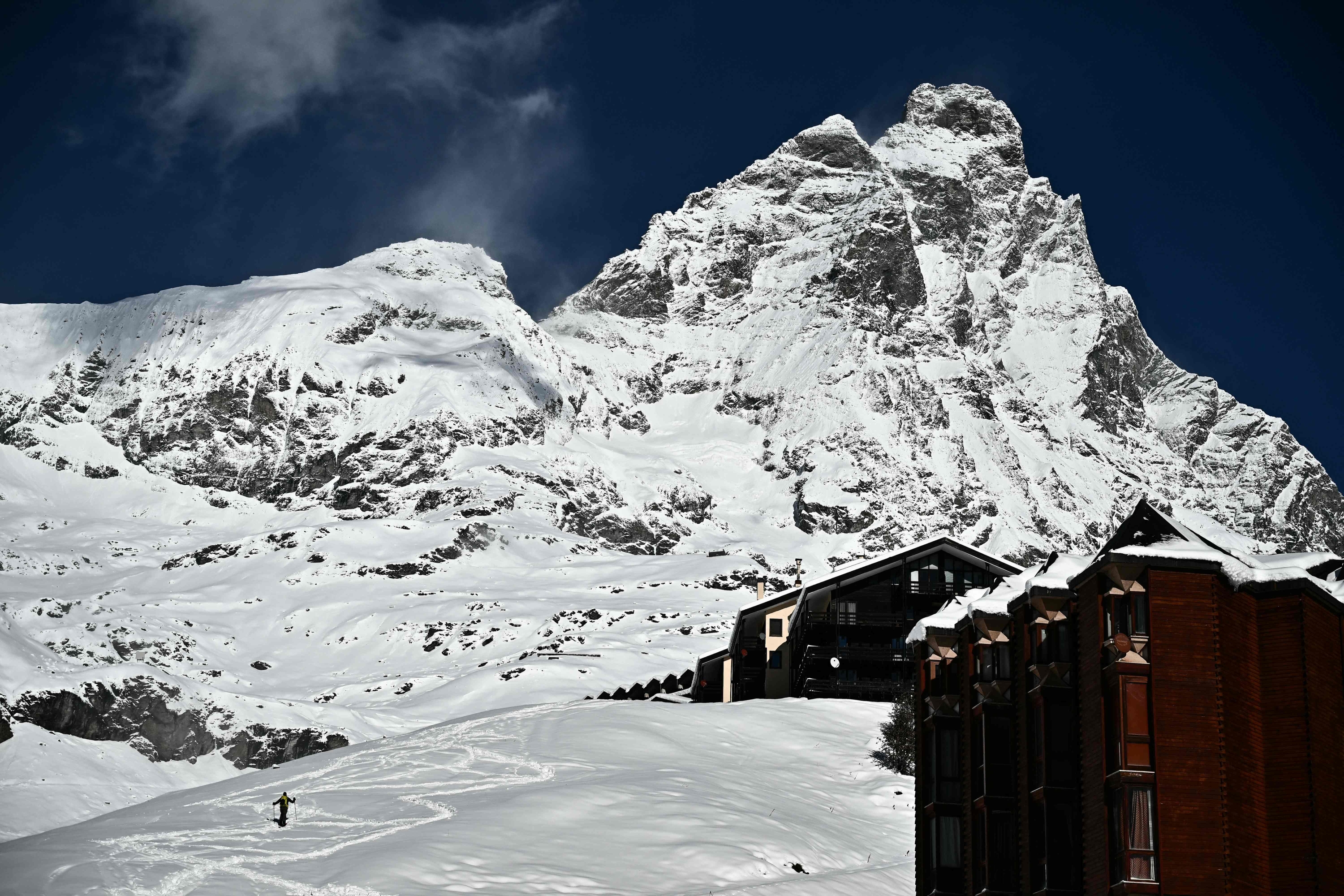 A general view taken from the ski resort of Cervinia on November 11, 2023 shows the Cervino mountain after the men's downhill was cancelled due to strong winds and heavy snow last night during the FIS Alpine Ski World Cup in Zermatt-Cervinia. (Photo by Marco BERTORELLO / AFP)