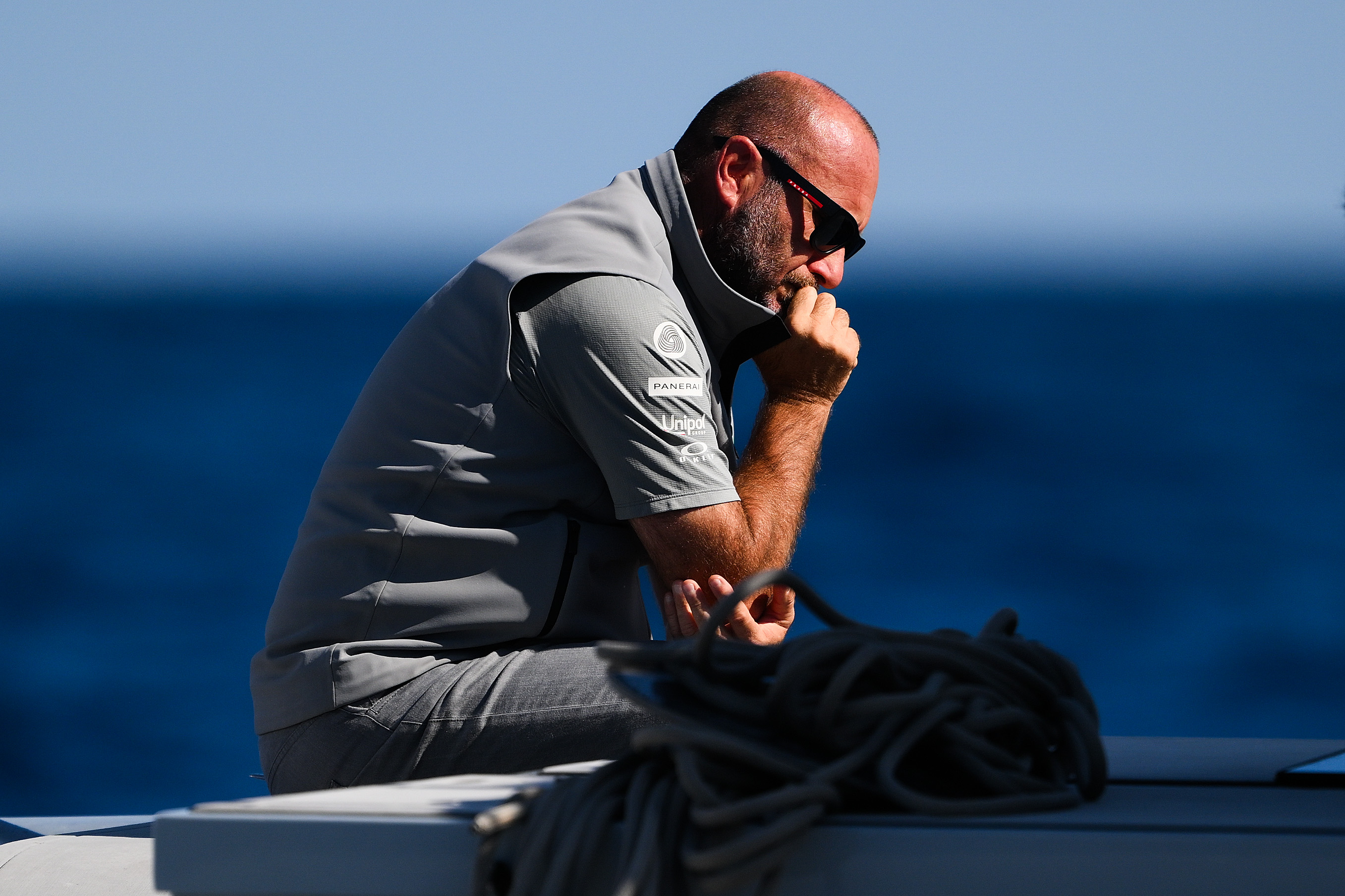 BARCELONA, SPAIN - OCTOBER 04: The AC75 Luna Rossa Prada Pirelli Team Director and Skipper Massimiliano 'Max' Sirena shows his dejection after being defeated by the AC75 Ineos Britannia Team  during the race 11 of the Louis Vuitton Cup Final - 37th America's Cup on October 04, 2024 in Barcelona, Spain. (Photo by David Ramos/Getty Images)