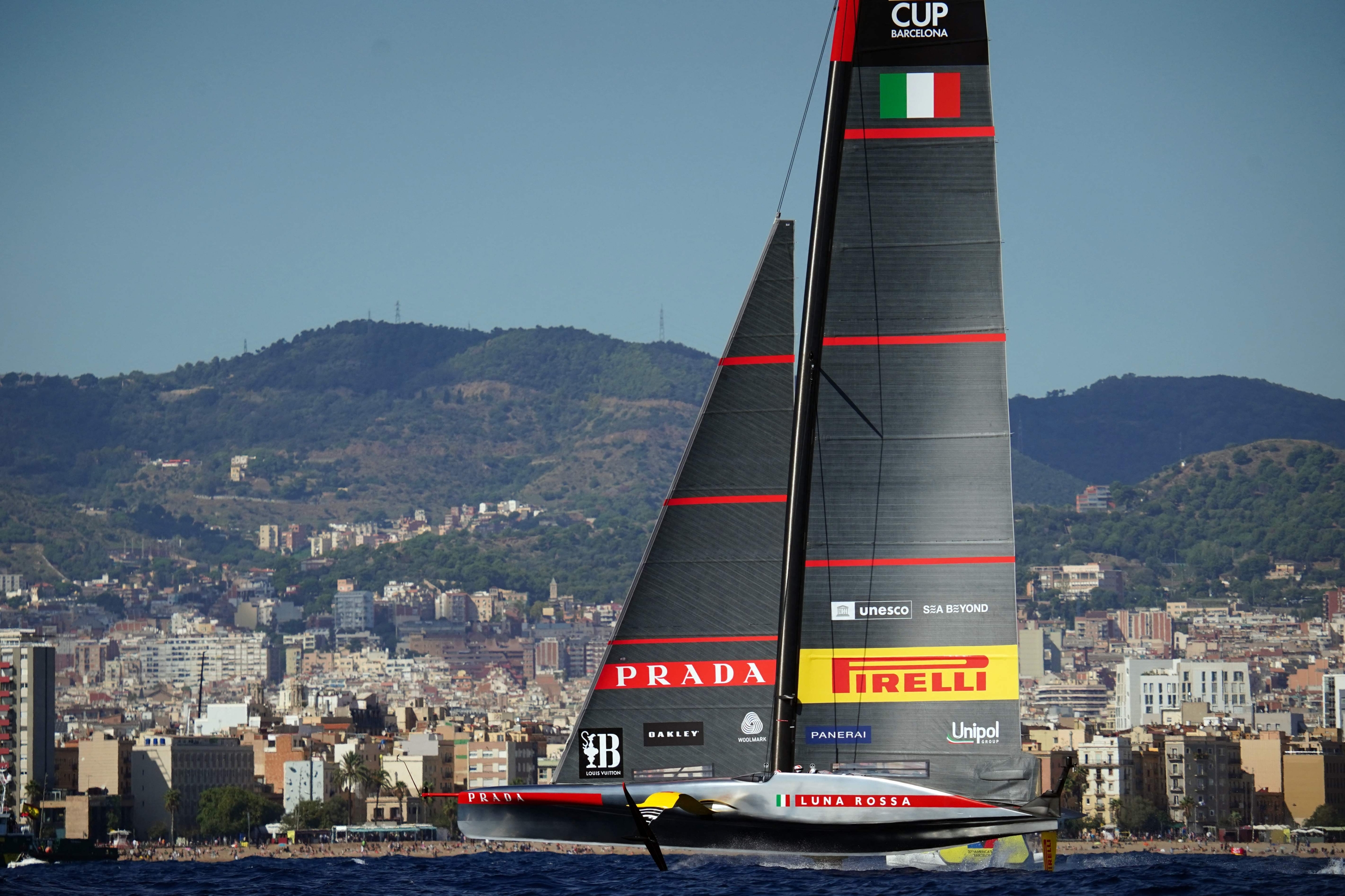 Italy's Luna Rossa Prada Pirelli competes against Britain's Ineos Britannia (not in frame) during the Louis Vuitton Cup final on day seven of the 37th America's Cup finals, off the coast of Barcelona on October 4, 2024. (Photo by Manaure Quintero / AFP)