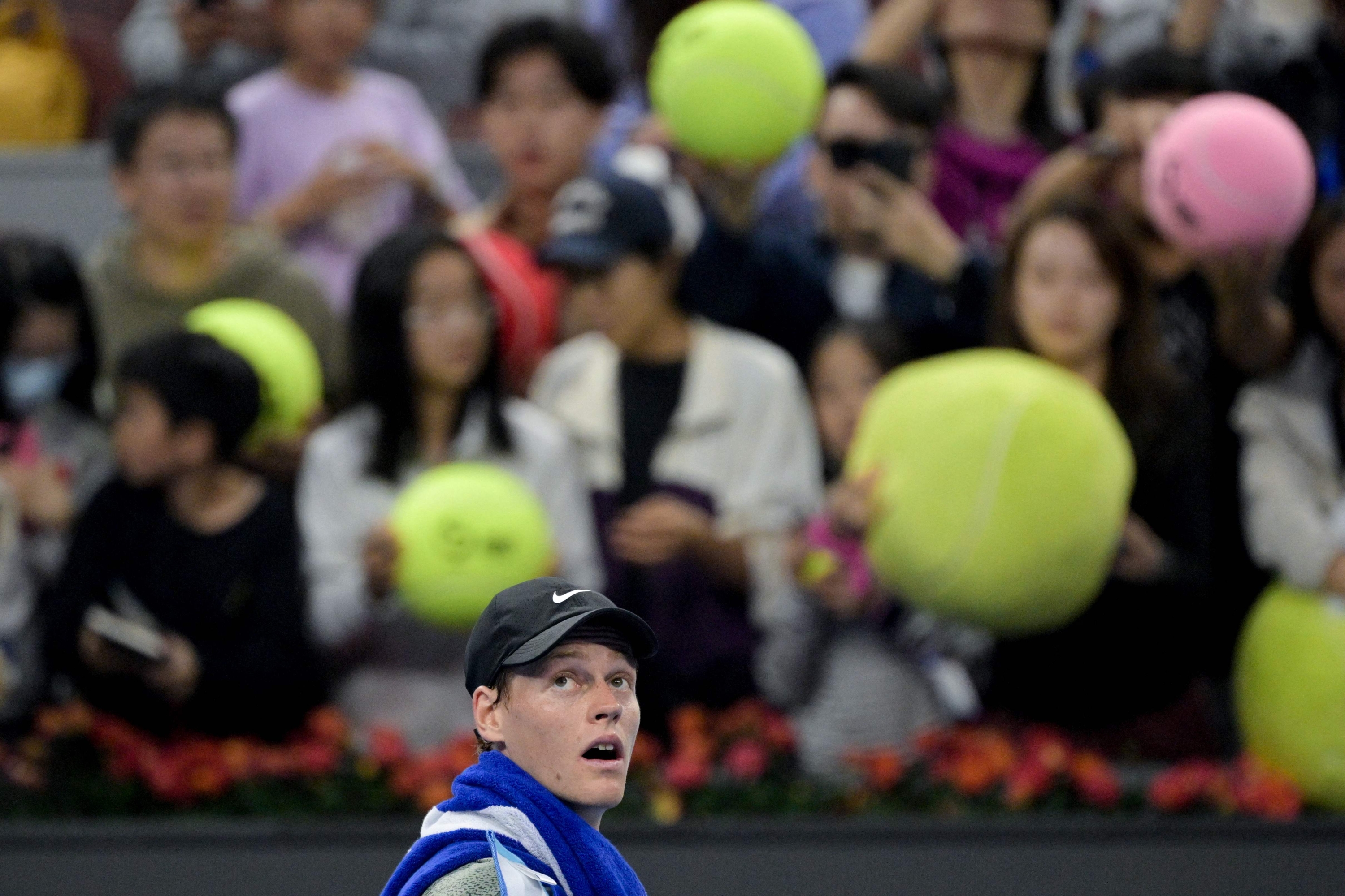 Italys Jannik Sinner looks on after winning against Russias Roman Safiullin during their men's singles match at the China Open tennis tournament in Beijing on September 28, 2024. (Photo by Jade Gao / AFP)