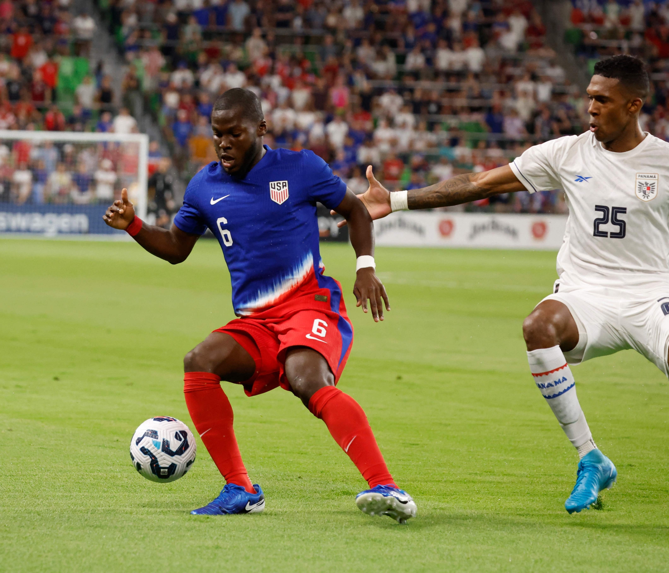 AUSTIN, TX - OCTOBER 12: Yunus Musah #6 of the US Men's National Team controls the ball against Roderick Miller #25 of Panama in the first half in an international friendly match at Q2 stadium on October 12, 2024 in Austin, Texas.   Ronald Cortes/Getty Images/AFP (Photo by Ronald Cortes / GETTY IMAGES NORTH AMERICA / Getty Images via AFP)