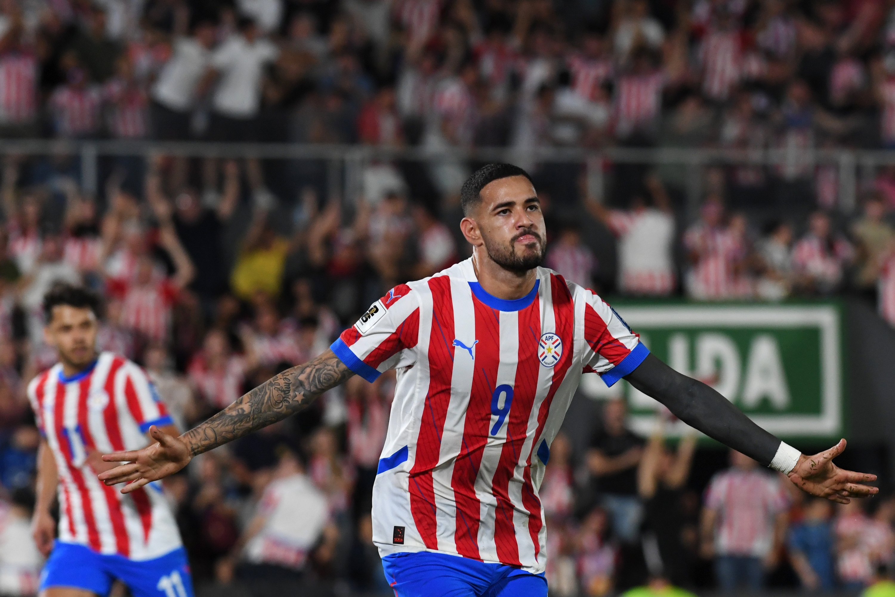 ASUNCION, PARAGUAY - OCTOBER 15: Antonio Sanabria of Paraguay celebrates after scoring the team's first goal during the FIFA World Cup 2026 South American Qualifier match between Paraguay and Venezuela at Estadio Defensores del Chaco on October 15, 2024 in Asuncion, Paraguay. (Photo by Christian Alvarenga/Getty Images)