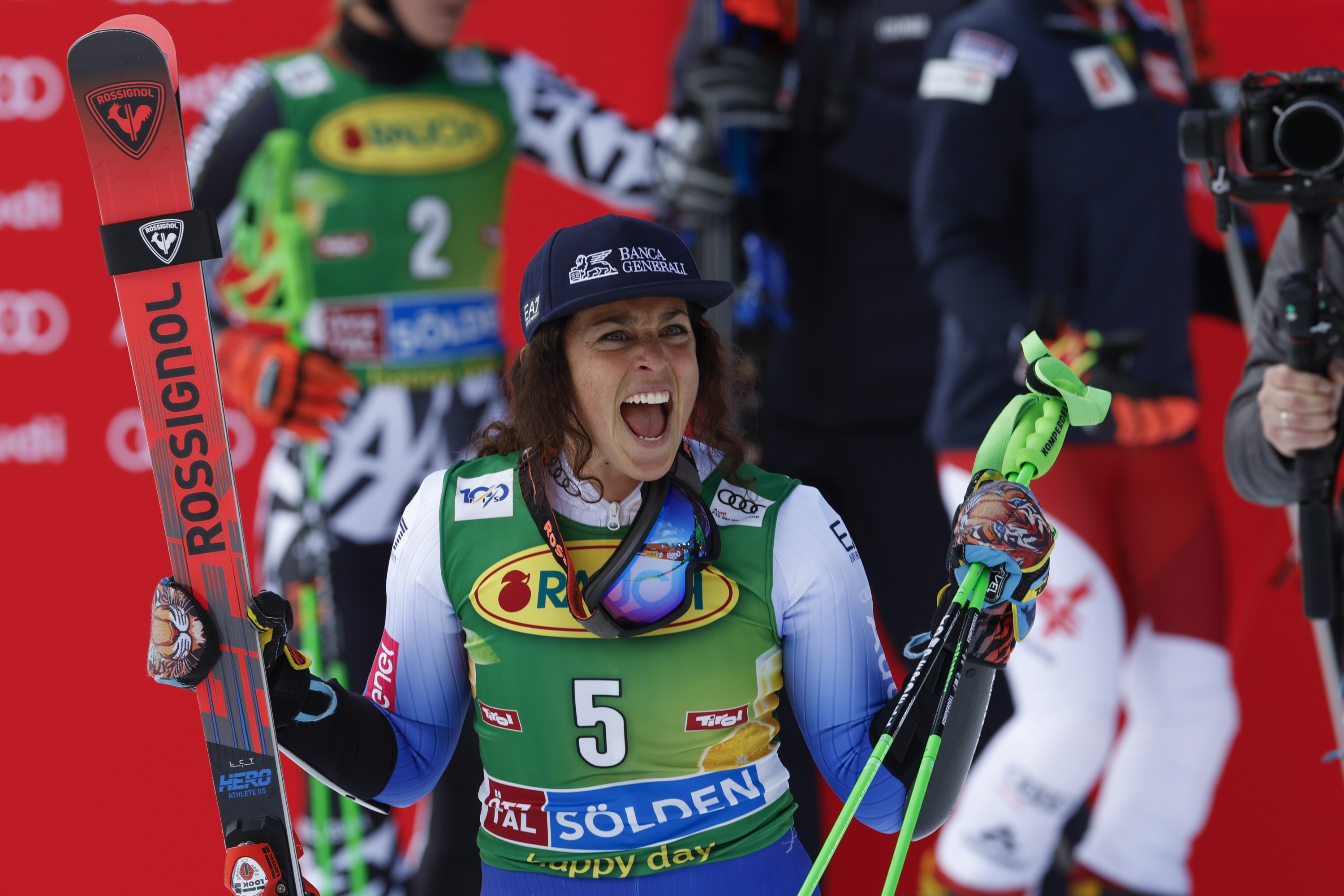 Italy's Federica Brignone celebrates winning an alpine ski, women's World Cup giant slalom, in Soelden, Austria, Saturday, Oct. 26, 2024. (AP Photo/Alessandro Trovati)