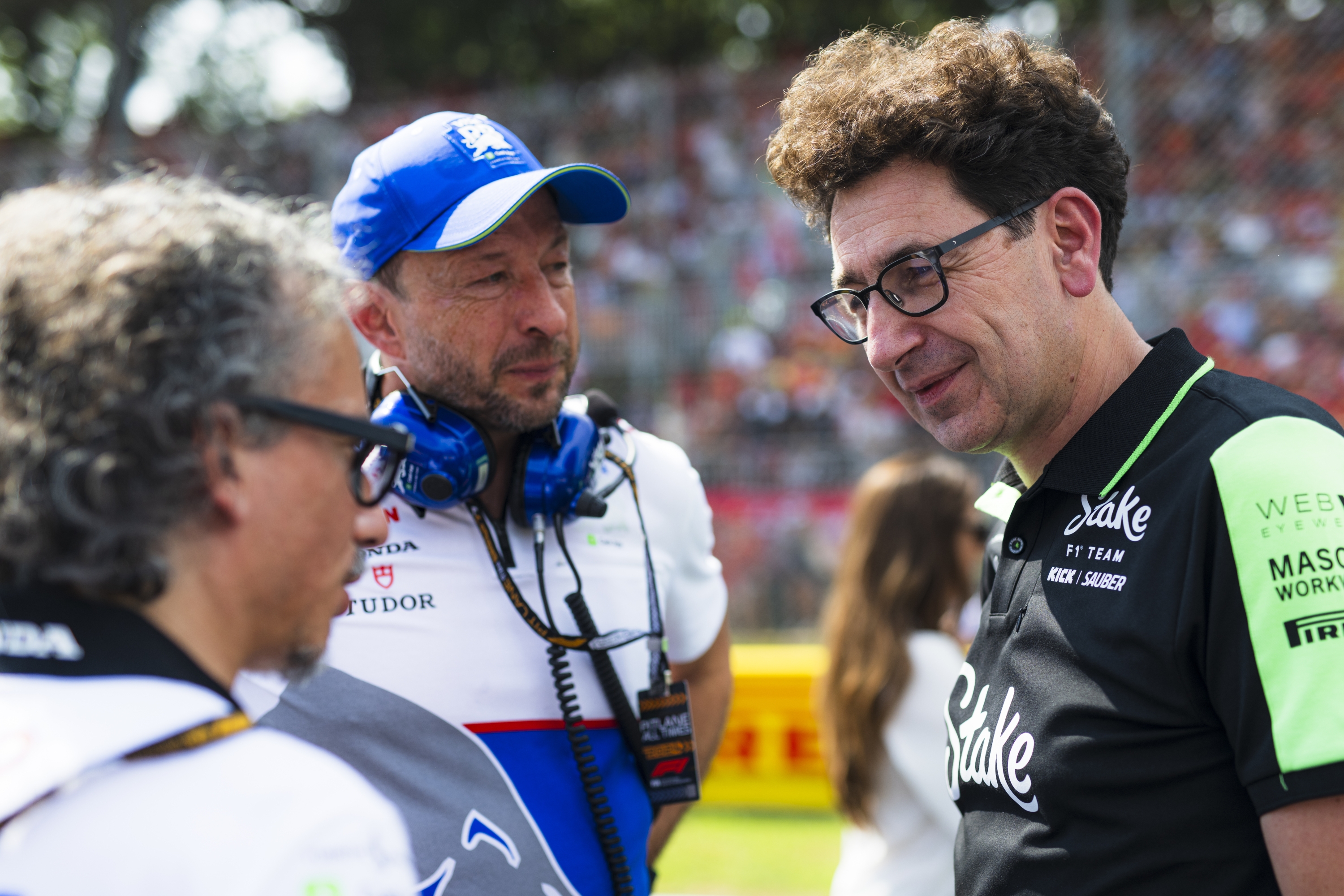 MONZA, ITALY - SEPTEMBER 01: Mattia Binotto, Stake F1 Team Kick Sauber boss speaks with Laurent Mekies, Team Principal of Visa Cash App RB and Peter Bayer, CEO of Visa Cash App RB on the grid prior to the F1 Grand Prix of Italy at Autodromo Nazionale Monza on September 01, 2024 in Monza, Italy. (Photo by Rudy Carezzevoli/Getty Images)