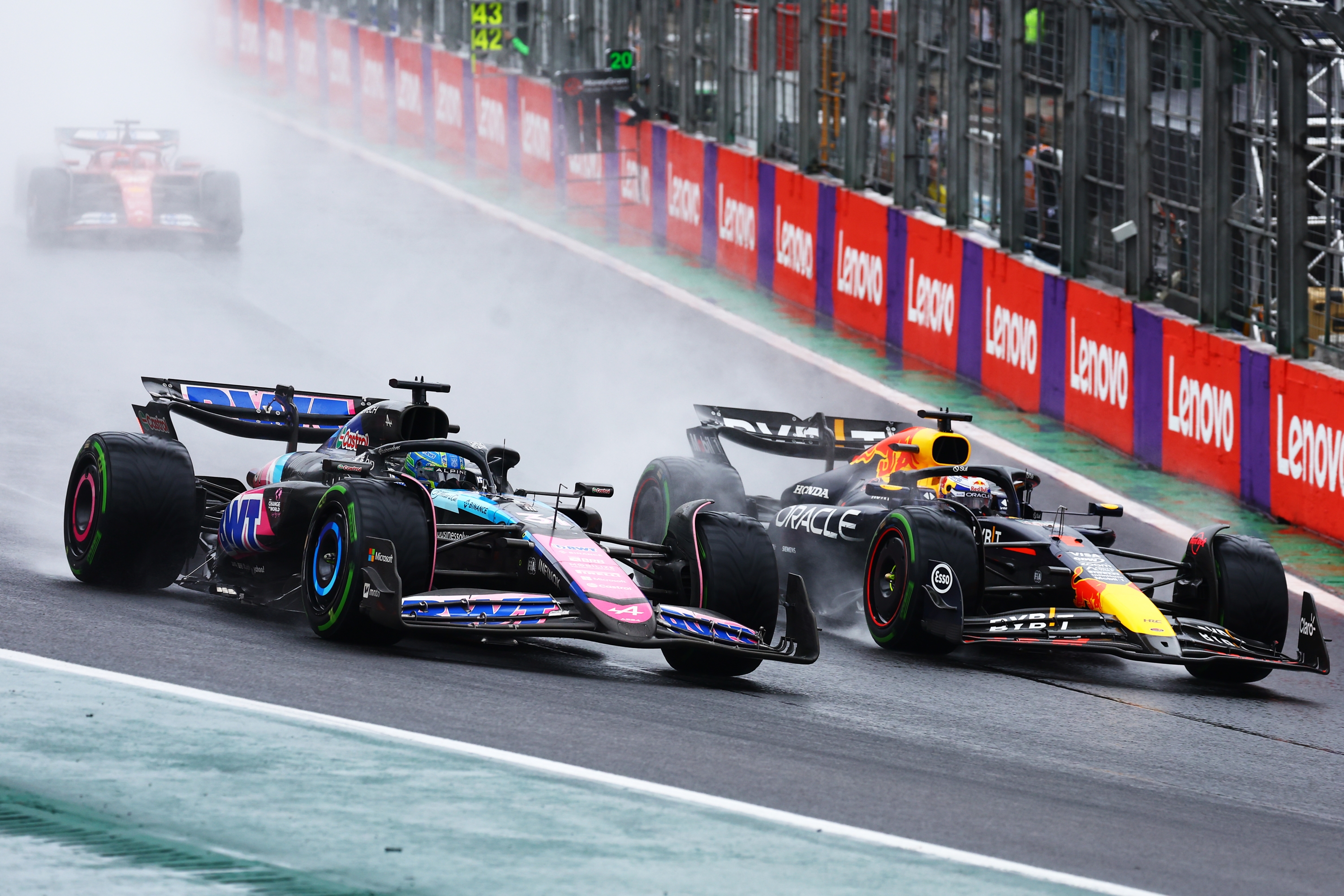 SAO PAULO, BRAZIL - NOVEMBER 03: Max Verstappen of the Netherlands driving the (1) Oracle Red Bull Racing RB20 overtakes Esteban Ocon of France driving the (31) Alpine F1 A524 Renault for the lead of the race at the safety car restart during the F1 Grand Prix of Brazil at Autodromo Jose Carlos Pace on November 03, 2024 in Sao Paulo, Brazil. (Photo by Mark Thompson/Getty Images)