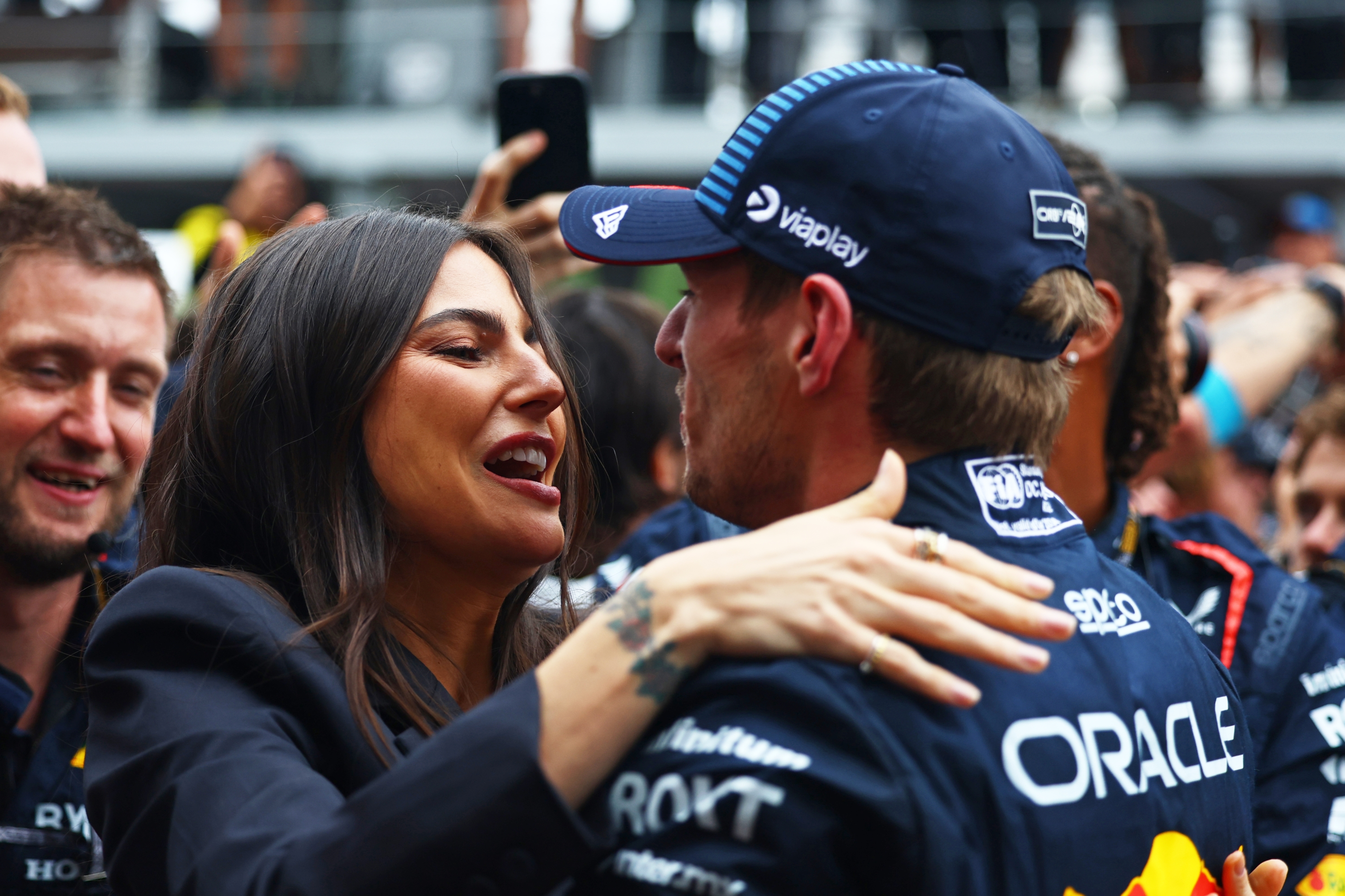 SAO PAULO, BRAZIL - NOVEMBER 03: Race winner Max Verstappen of the Netherlands and Oracle Red Bull Racing celebrates with Kelly Piquet in parc ferme during the F1 Grand Prix of Brazil at Autodromo Jose Carlos Pace on November 03, 2024 in Sao Paulo, Brazil. (Photo by Mark Thompson/Getty Images)