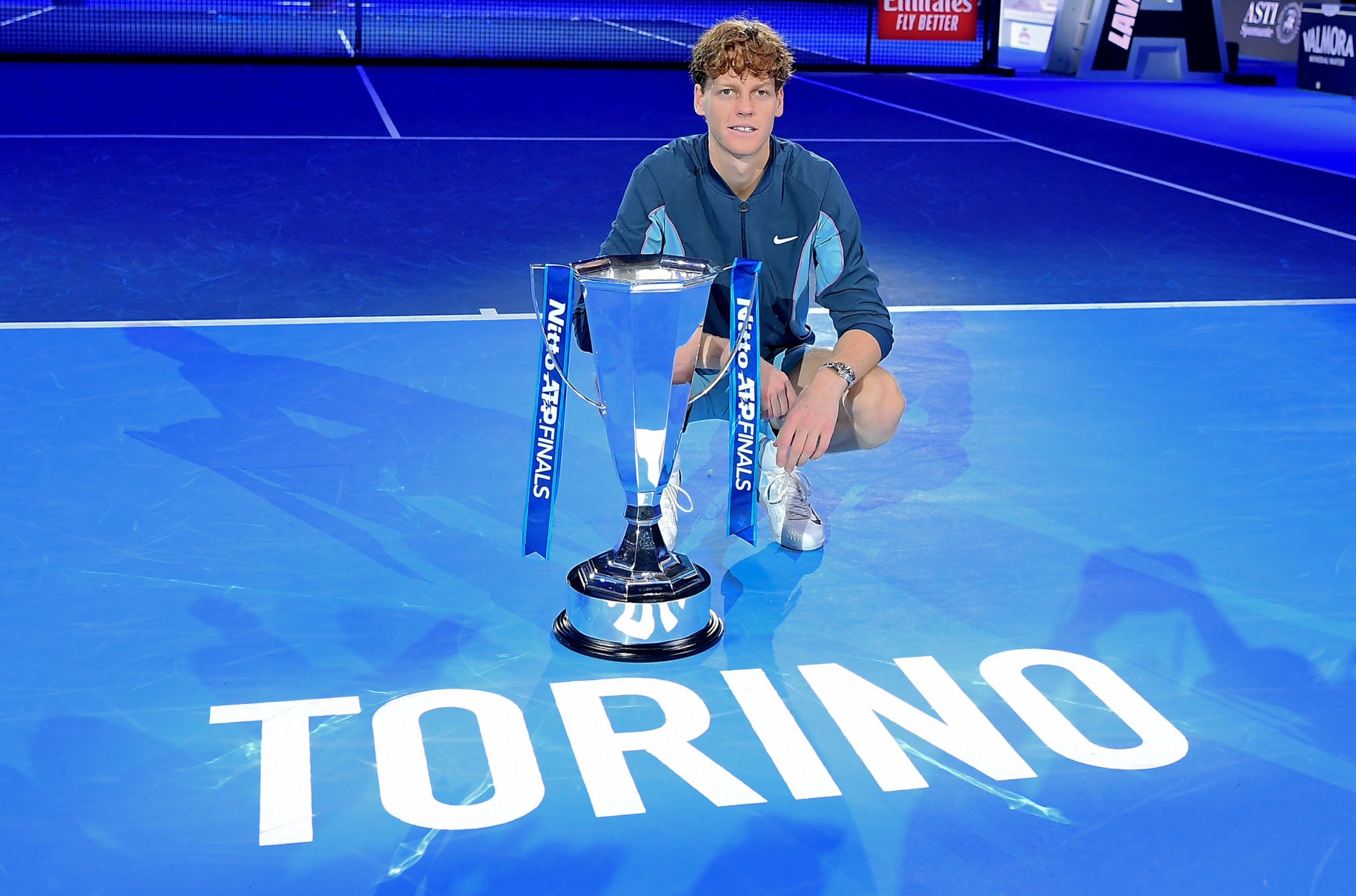 Italy's Jannik Sinner with the trophy after winning the final against USA's Taylor Fritz at the ATP Finals tennis tournament in Turin, Italy, 17 November 2024.  ANSA/ALESSANDRO DI MARCO