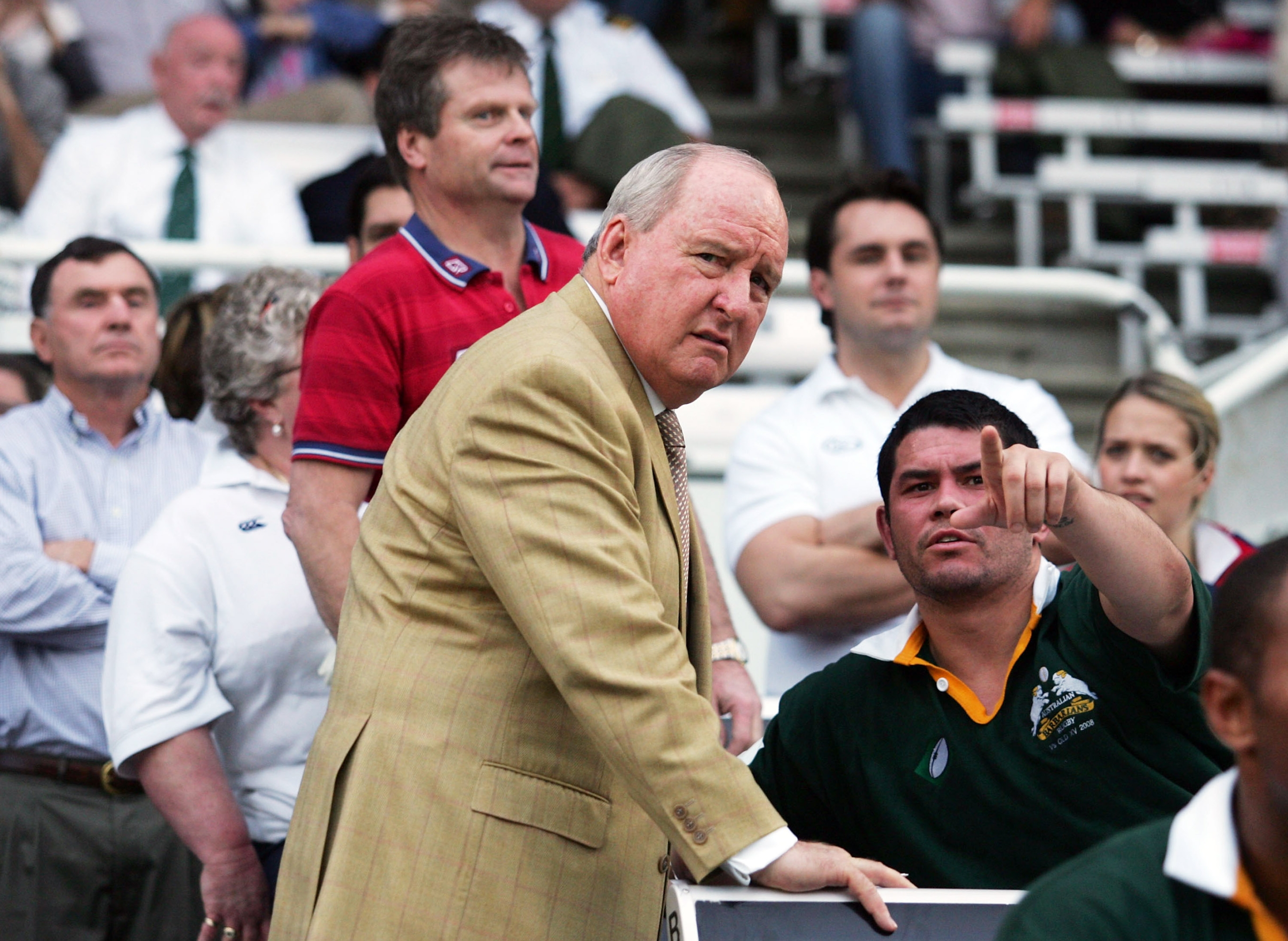 BRISBANE, AUSTRALIA - JULY 13: Alan Jones, Coach of the Barbarians chats with Jeremy Paul during the match between a Queensland XV and the  Australian Barbarians at Ballymore on July 13, 2008 in Brisbane, Australia.  (Photo by Jonathan Wood/Getty Images)