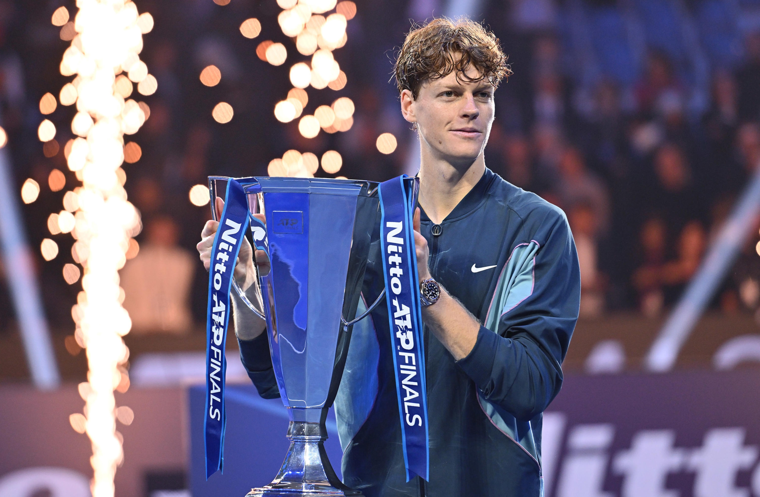 Italy's Jannik Sinner with the trophy after winning the final against USA's Taylor Fritz at the ATP Finals tennis tournament in Turin, Italy, 17 November 2024.  ANSA/ALESSANDRO DI MARCO