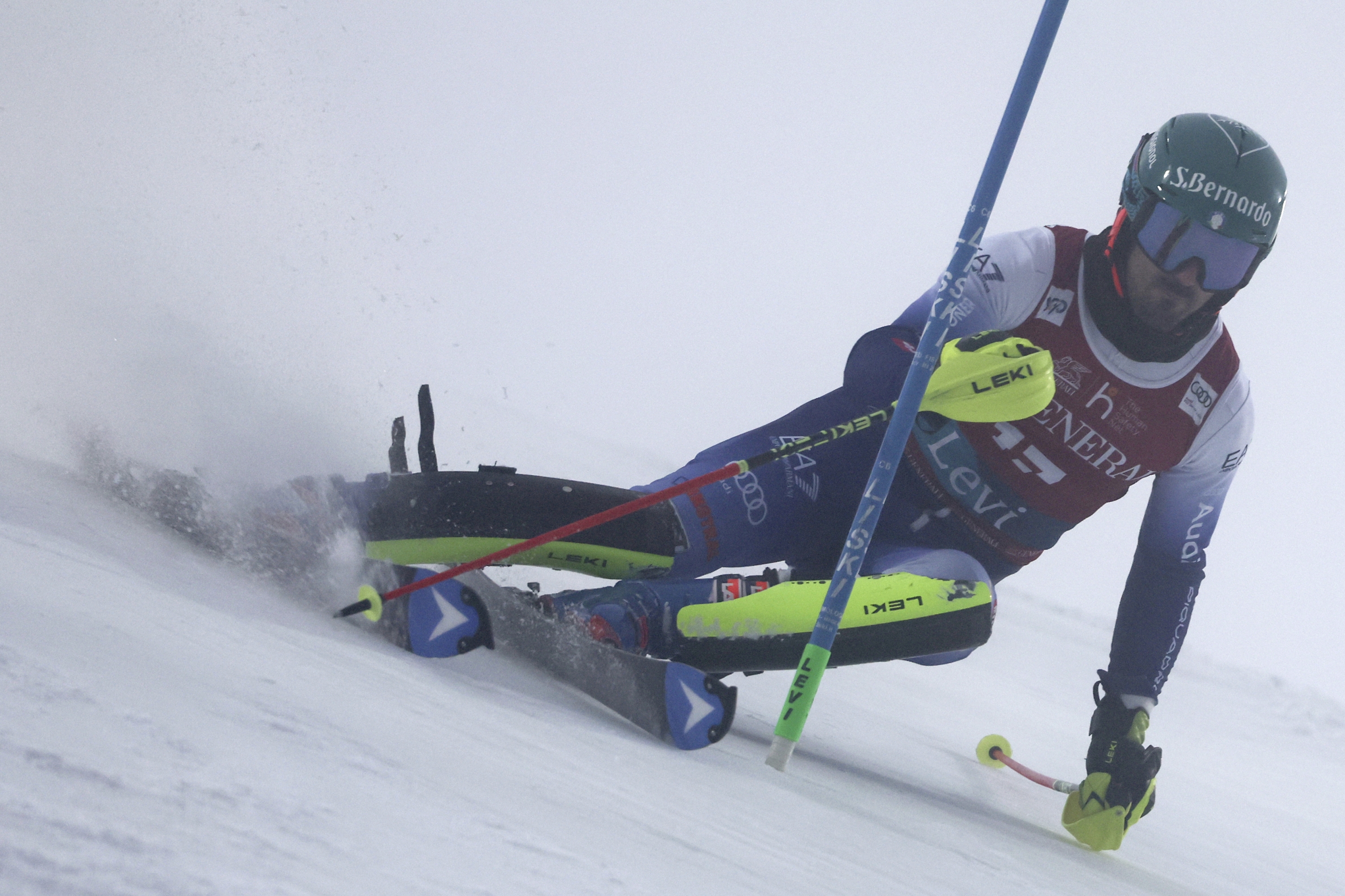 Italy's Tommaso Sala speeds down the course during an alpine ski, men's World Cup slalom, in Levi, Finland, Sunday, Nov. 17, 2024. (AP Photo/Marco Trovati)