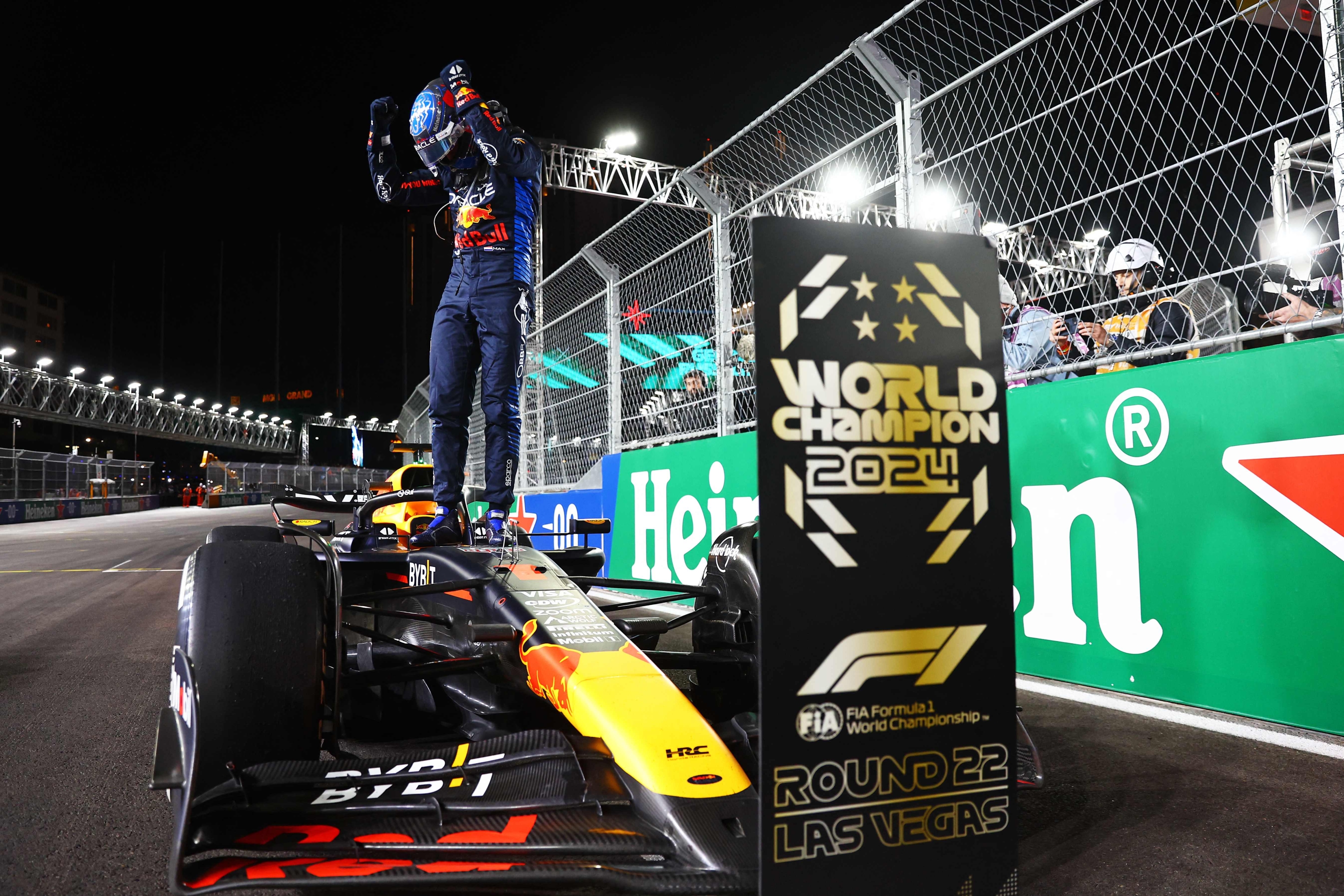 LAS VEGAS, NEVADA - NOVEMBER 23: 2024 F1 World Drivers Champion Max Verstappen of the Netherlands and Oracle Red Bull Racing celebrates in parc ferme during the F1 Grand Prix of Las Vegas at Las Vegas Strip Circuit on November 23, 2024 in Las Vegas, Nevada.   Mark Thompson/Getty Images/AFP (Photo by Mark Thompson / GETTY IMAGES NORTH AMERICA / Getty Images via AFP)