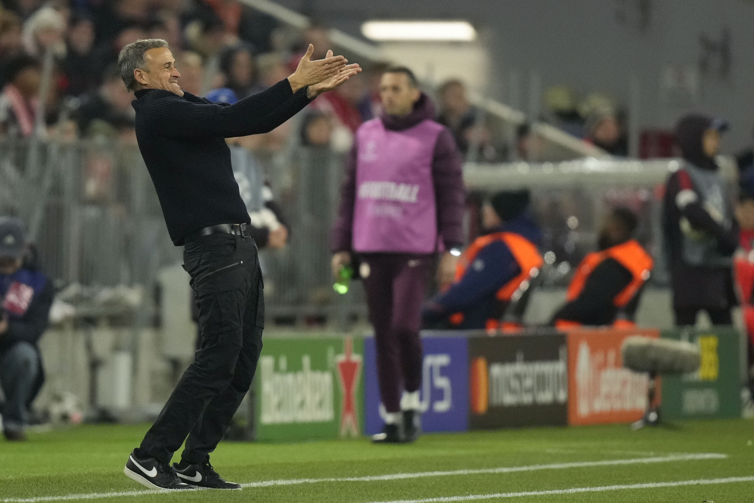 PSG's head coach Luis Enrique reacts during the Champions League opening phase soccer match between FC Bayern and Paris Saint Germain, at the Allianz Arena in Munich, Germany, Tuesday, Nov. 26, 2024.(AP Photo/Matthias Schrader)