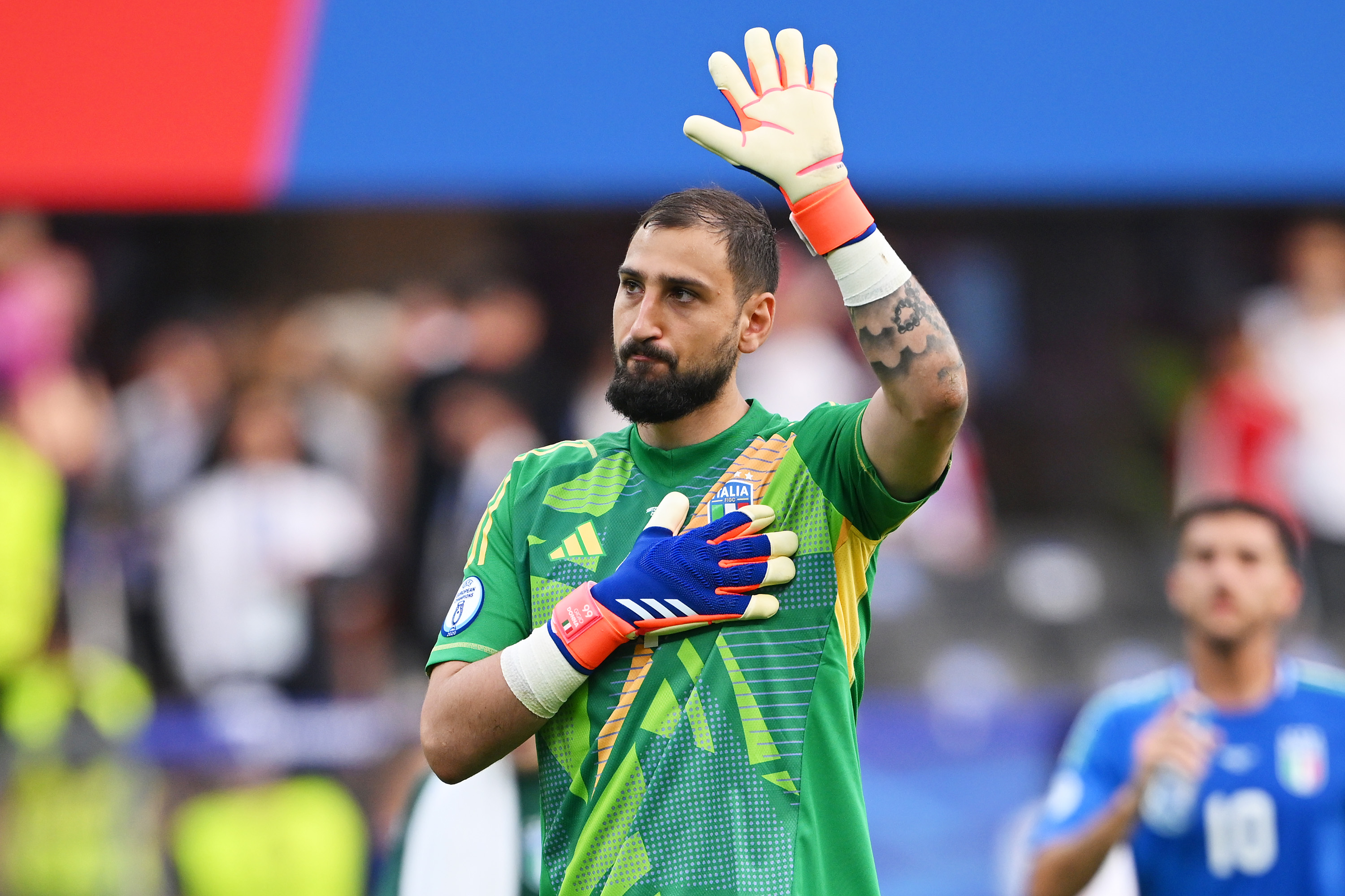 BERLIN, GERMANY - JUNE 29: Gianluigi Donnarumma of Italy acknowledges the fans after the team's defeat and elimination from EURO 2024 in the UEFA EURO 2024 round of 16 match between Switzerland and Italy at Olympiastadion on June 29, 2024 in Berlin, Germany. (Photo by Stu Forster/Getty Images)