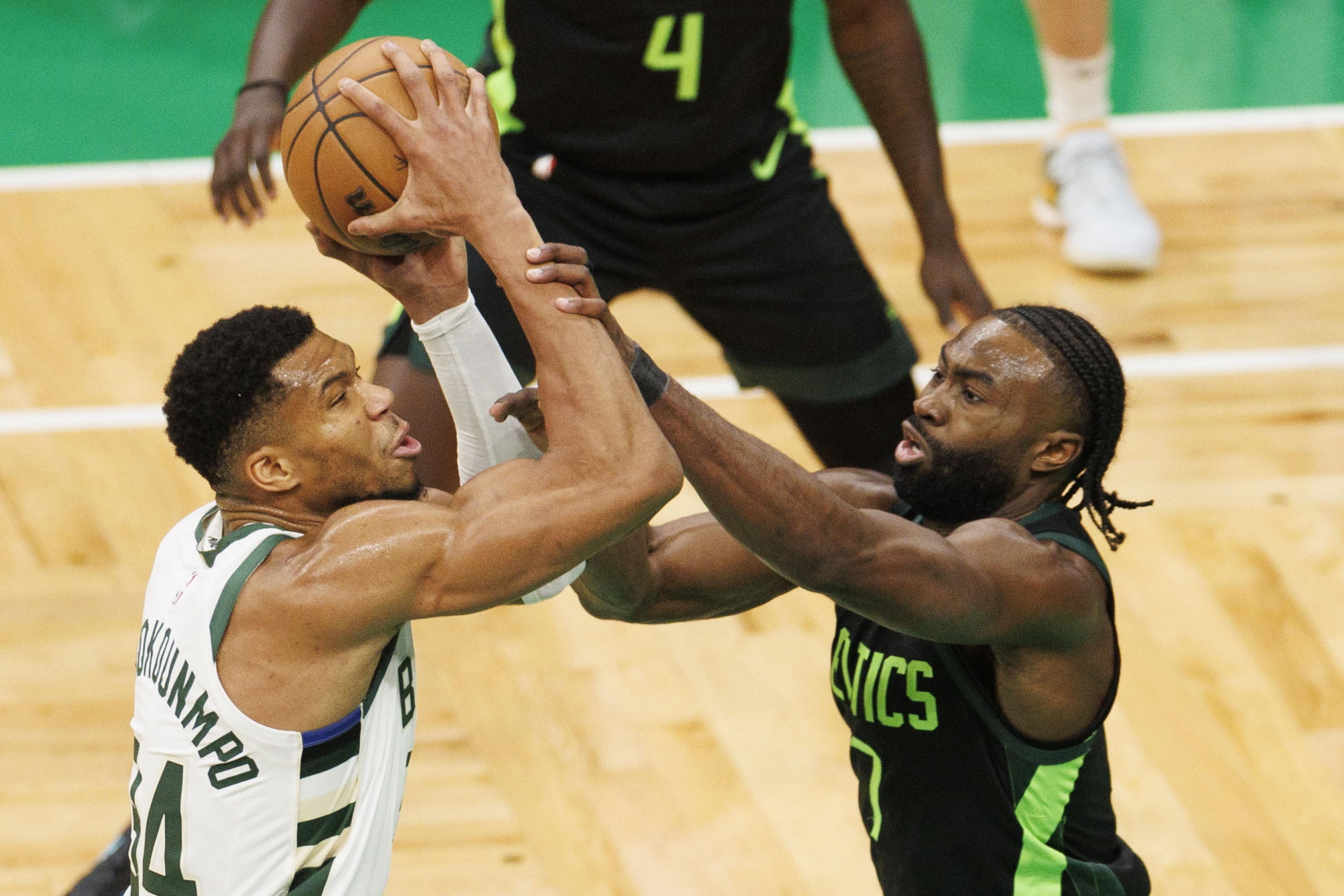 epa11761382 Milwaukee Bucks forward Giannis Antetokounmpo (L) is fouled by Boston Celtics guard Jaylen Brown (R) during the NBA game between the Boston Celtics and the Milwaukee Bucks in Boston, Massachusetts, USA, 06 December 2024.  EPA/CJ GUNTHER  SHUTTERSTOCK OUT