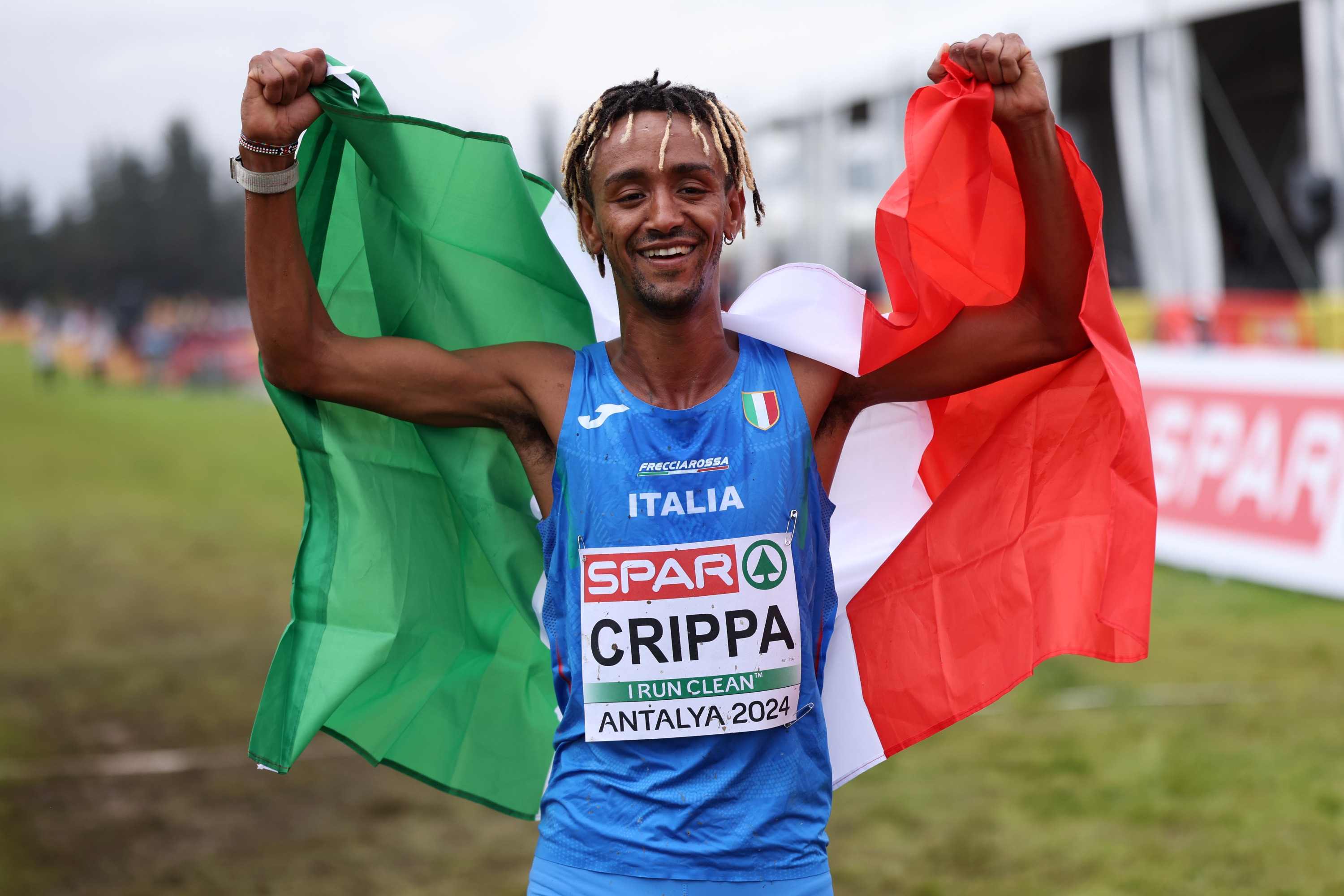 ANTALYA, TURKEY - DECEMBER 08: Yemaneberhan Crippa of Team Italy celebrates wining silver in the Men's Senior cross country race during the 30th SPAR European Cross Country Championships on December 08, 2024 in Antalya, Turkey. (Photo by Maja Hitij/Getty Images for European Athletics)