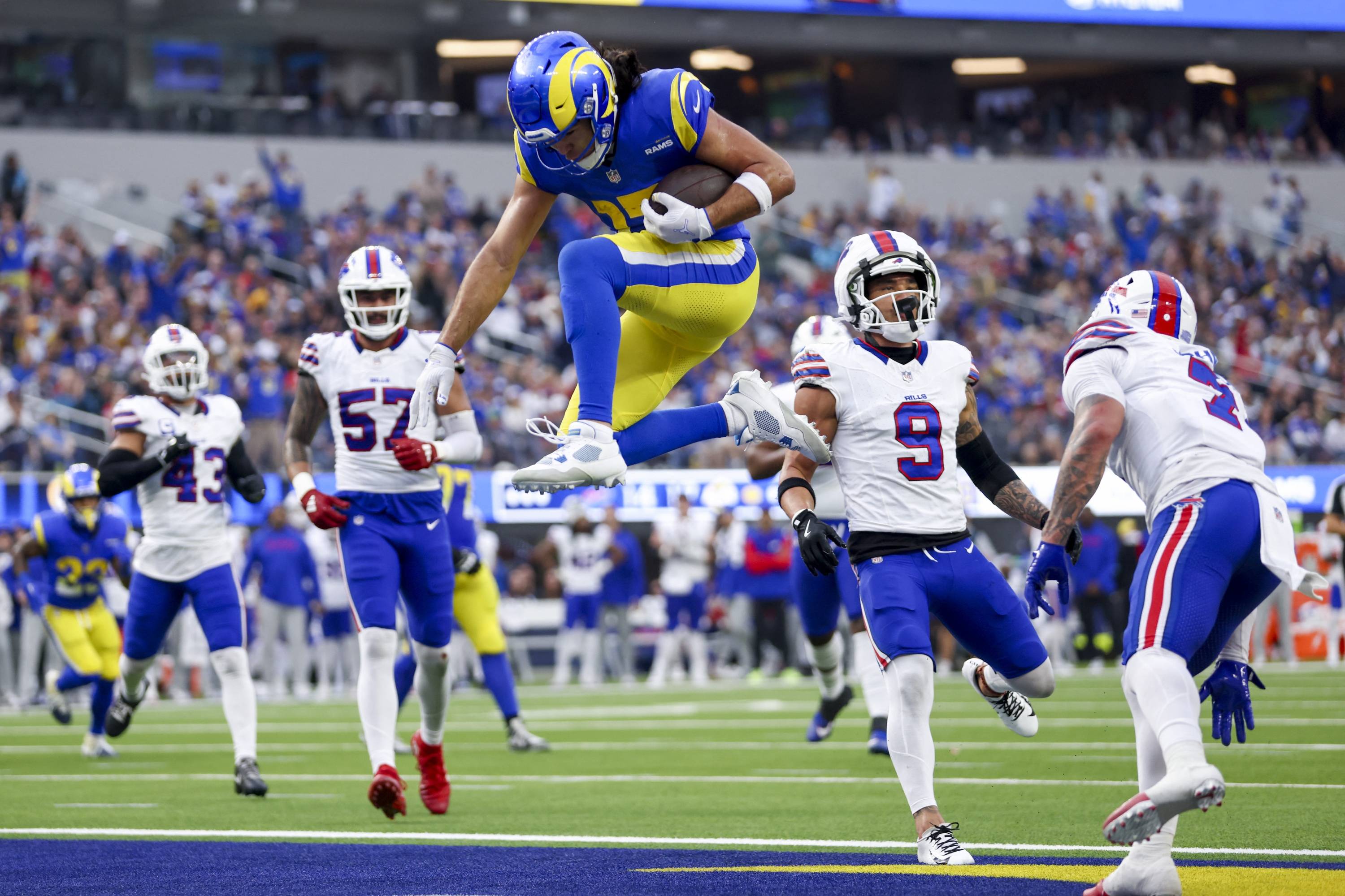 INGLEWOOD, CALIFORNIA - DECEMBER 08: Puka Nacua #17 of the Los Angeles Rams scores a touchdown in the second quarter of a game against the Buffalo Bills at SoFi Stadium on December 08, 2024 in Inglewood, California.   Katelyn Mulcahy/Getty Images/AFP (Photo by Katelyn Mulcahy / GETTY IMAGES NORTH AMERICA / Getty Images via AFP)