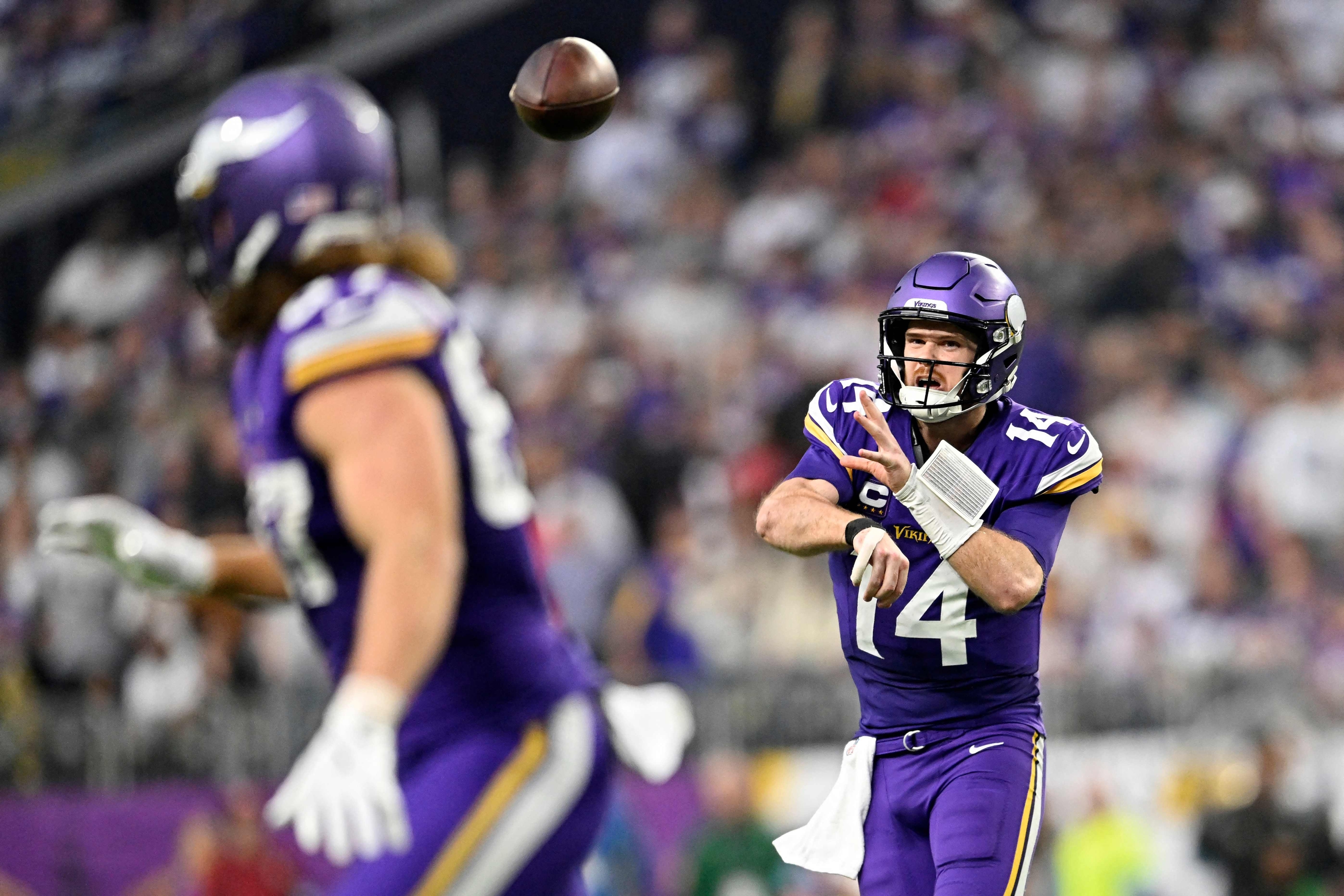 MINNEAPOLIS, MINNESOTA - DECEMBER 08: Sam Darnold #14 of the Minnesota Vikings throws a pass against the Atlanta Falcons during the fourth quarter at U.S. Bank Stadium on December 08, 2024 in Minneapolis, Minnesota.   Stephen Maturen/Getty Images/AFP (Photo by Stephen Maturen / GETTY IMAGES NORTH AMERICA / Getty Images via AFP)