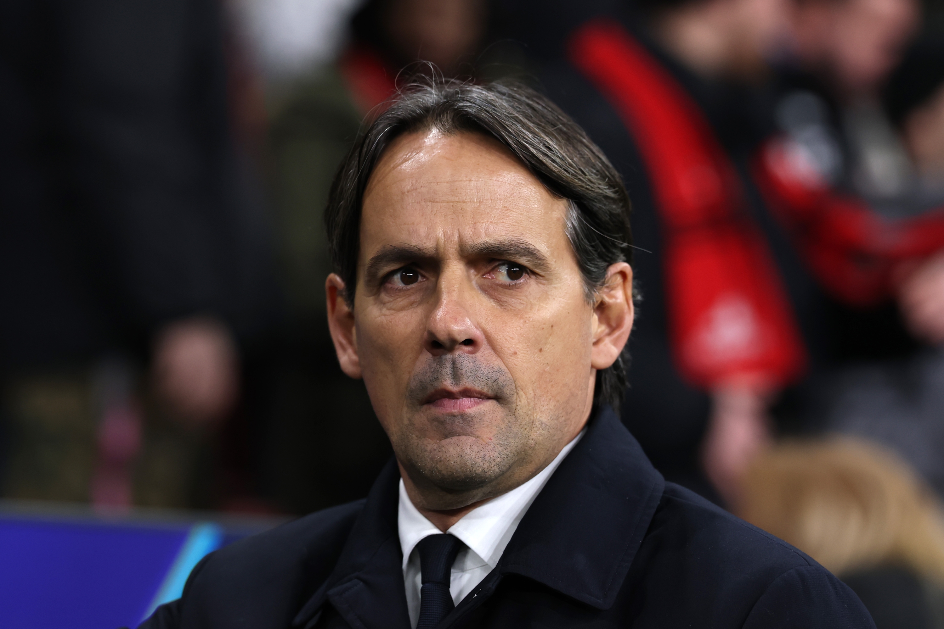 LEVERKUSEN, GERMANY - DECEMBER 10: Simone Inzaghi, Head Coach of FC Internazionale, looks on prior to the UEFA Champions League 2024/25 League Phase MD6 match between Bayer 04 Leverkusen and FC Internazionale Milano at BayArena on December 10, 2024 in Leverkusen, Germany. (Photo by Lars Baron/Getty Images)