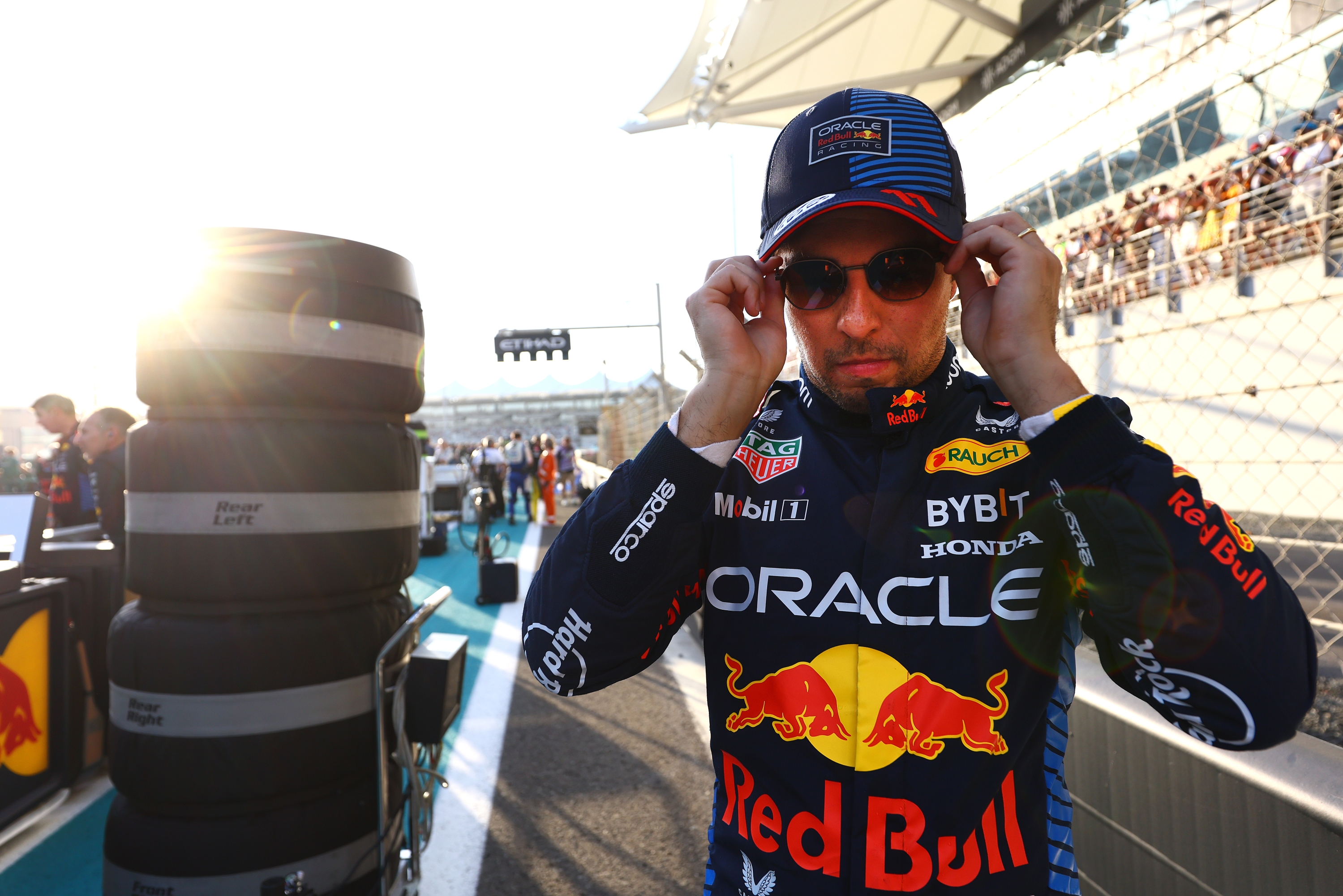 ABU DHABI, UNITED ARAB EMIRATES - DECEMBER 08: Sergio Perez of Mexico and Oracle Red Bull Racing prepares to drive on the grid during the F1 Grand Prix of Abu Dhabi at Yas Marina Circuit on December 08, 2024 in Abu Dhabi, United Arab Emirates. (Photo by Mark Thompson/Getty Images)