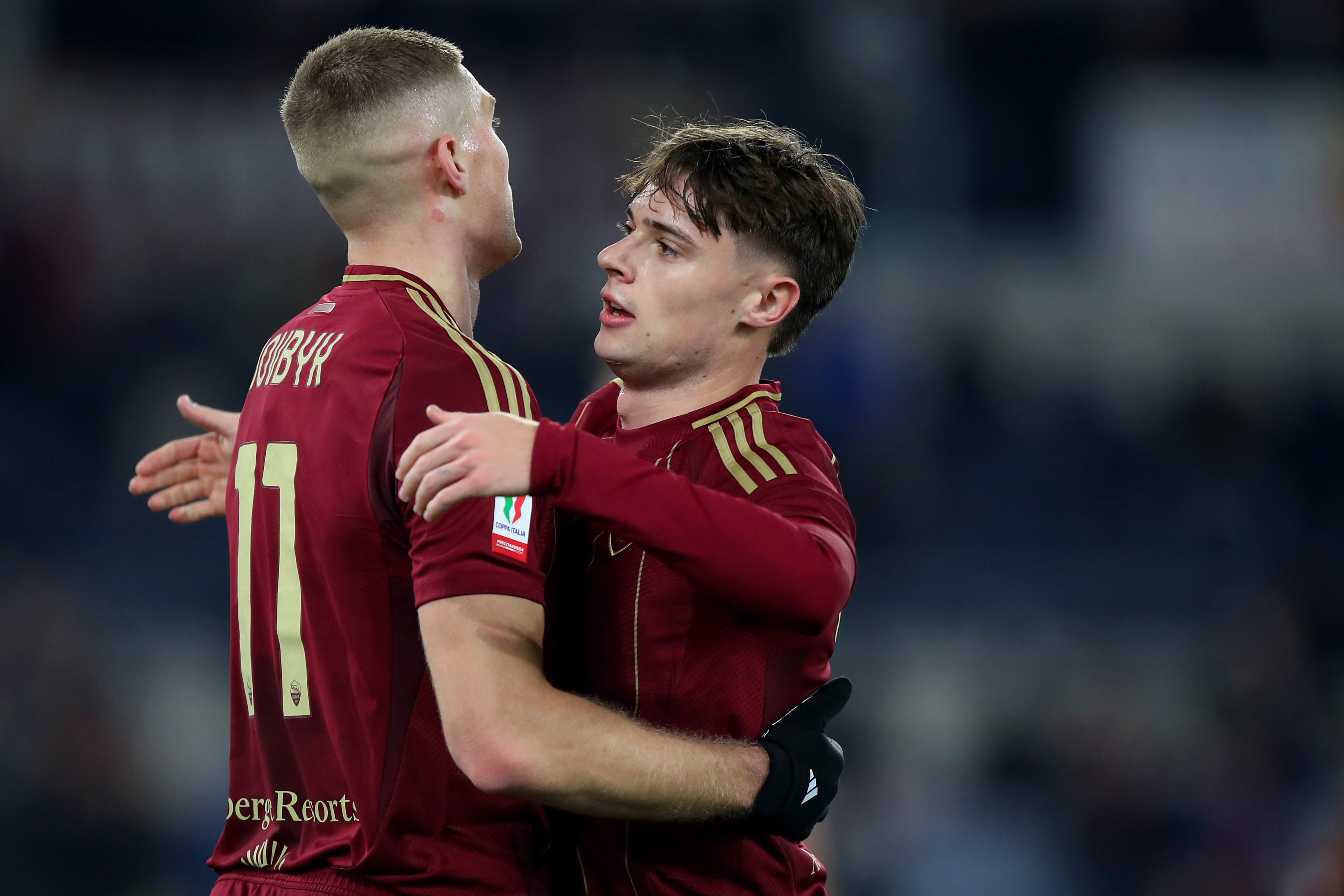 ROME, ITALY - DECEMBER 18: Artem Dovbyk of AS Roma celebrates with teammate Nicola Zalewski after scoring his team's second goal during the Coppa Italia Third Round match between AS Roma and Sampdoria at Stadio Olimpico on December 18, 2024 in Rome, Italy. (Photo by Paolo Bruno/Getty Images)