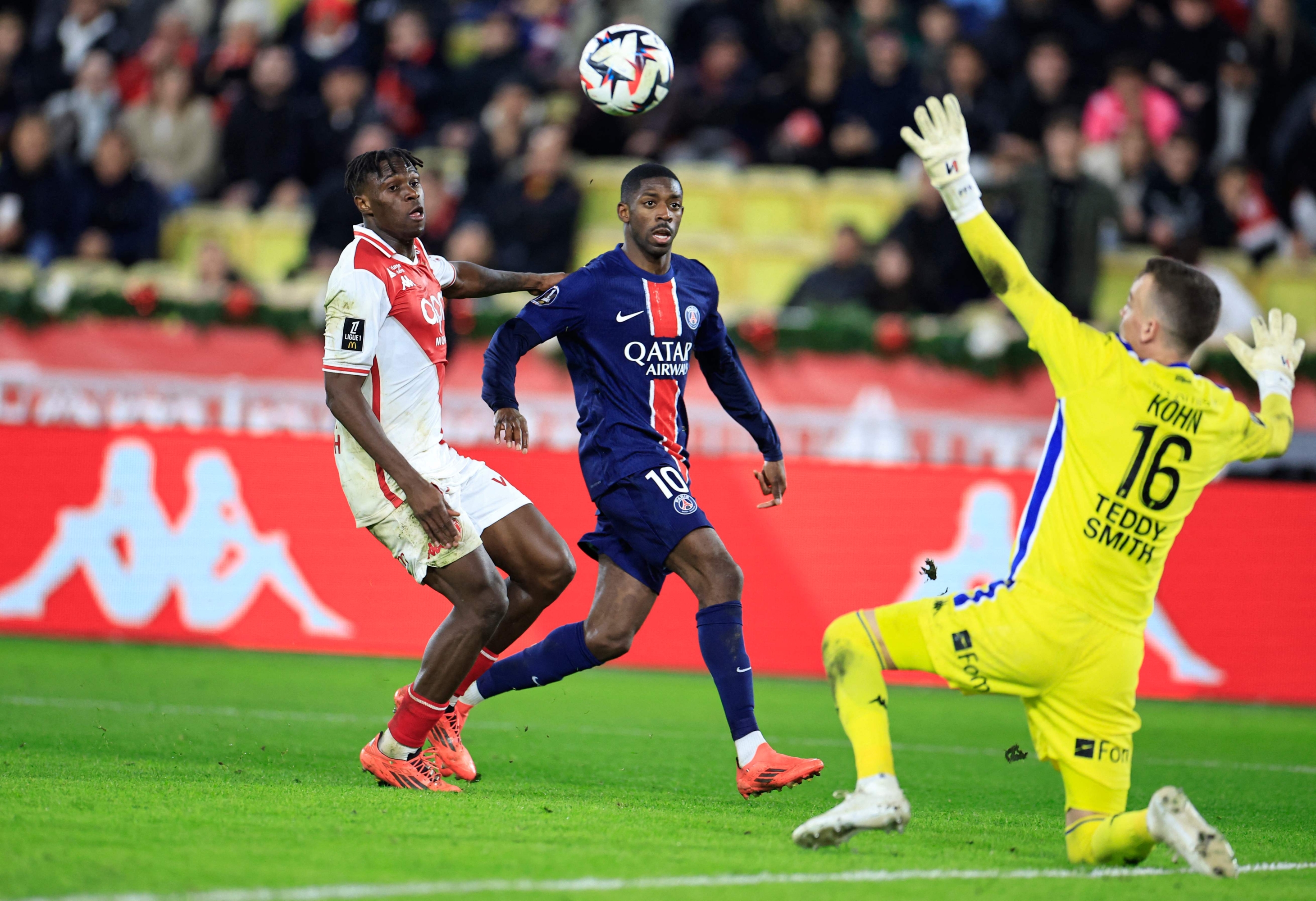 Paris Saint-Germain's French forward #10 Ousmane Dembele (C) celebrates scoring his team's fourth goal during the French L1 football match between AS Monaco and Paris Saint-Germain at the Louis II Stadium (Stade Louis II) in the Principality of Monaco on December 18, 2024. (Photo by Valery HACHE / AFP)